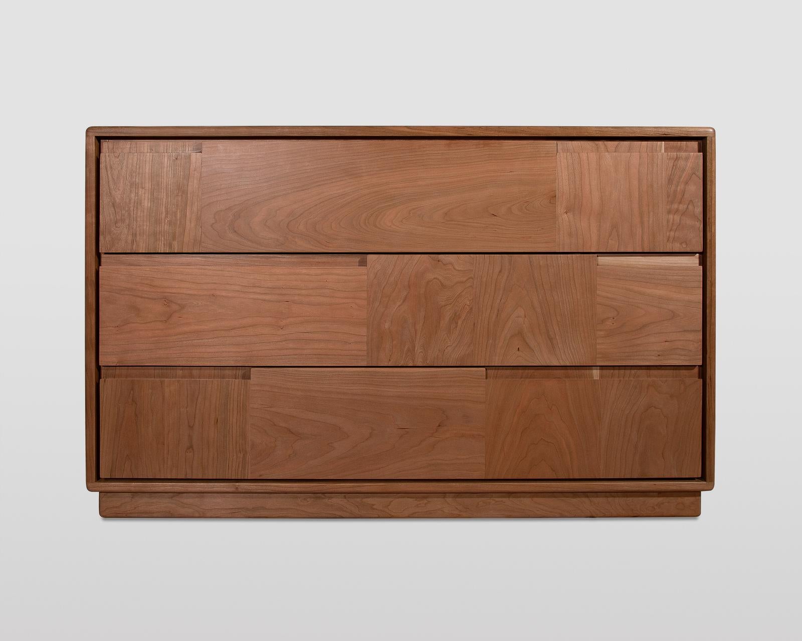 Boasting pure and simple lines, the Nordic Chest of Drawers represents modern Italian cabinetry at its finest. Handcrafted of solid cherry wood, it features three drawers with a Blumotion slow closing system, whose front panels showcase the wood’s