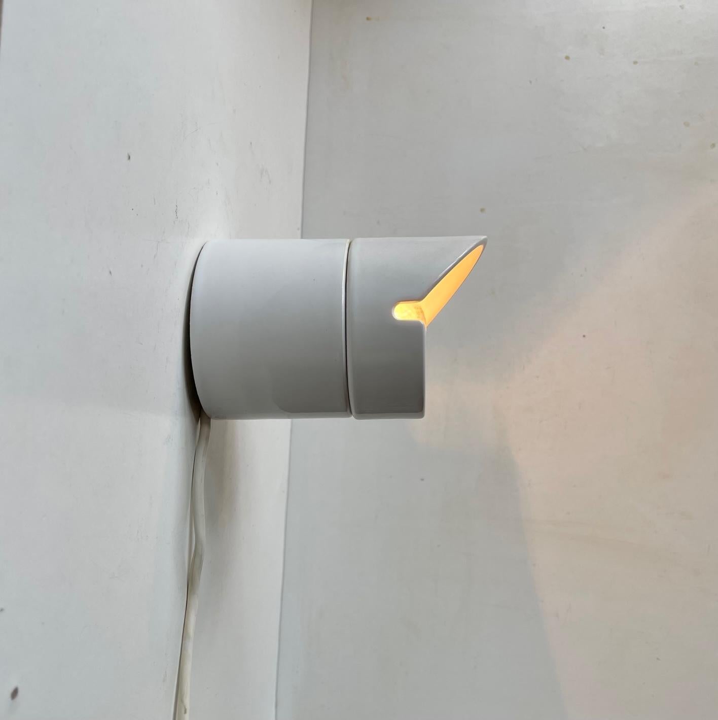 Industrial - Bauhaus inspired bathroom wall light in white porcelain. Model number: 6050b designed by Knud Holscher for Ifö in Sweden and manufactured during the 1980s. Together with Sigvard Bernadotte Holscher stand for some of the most popular ifs