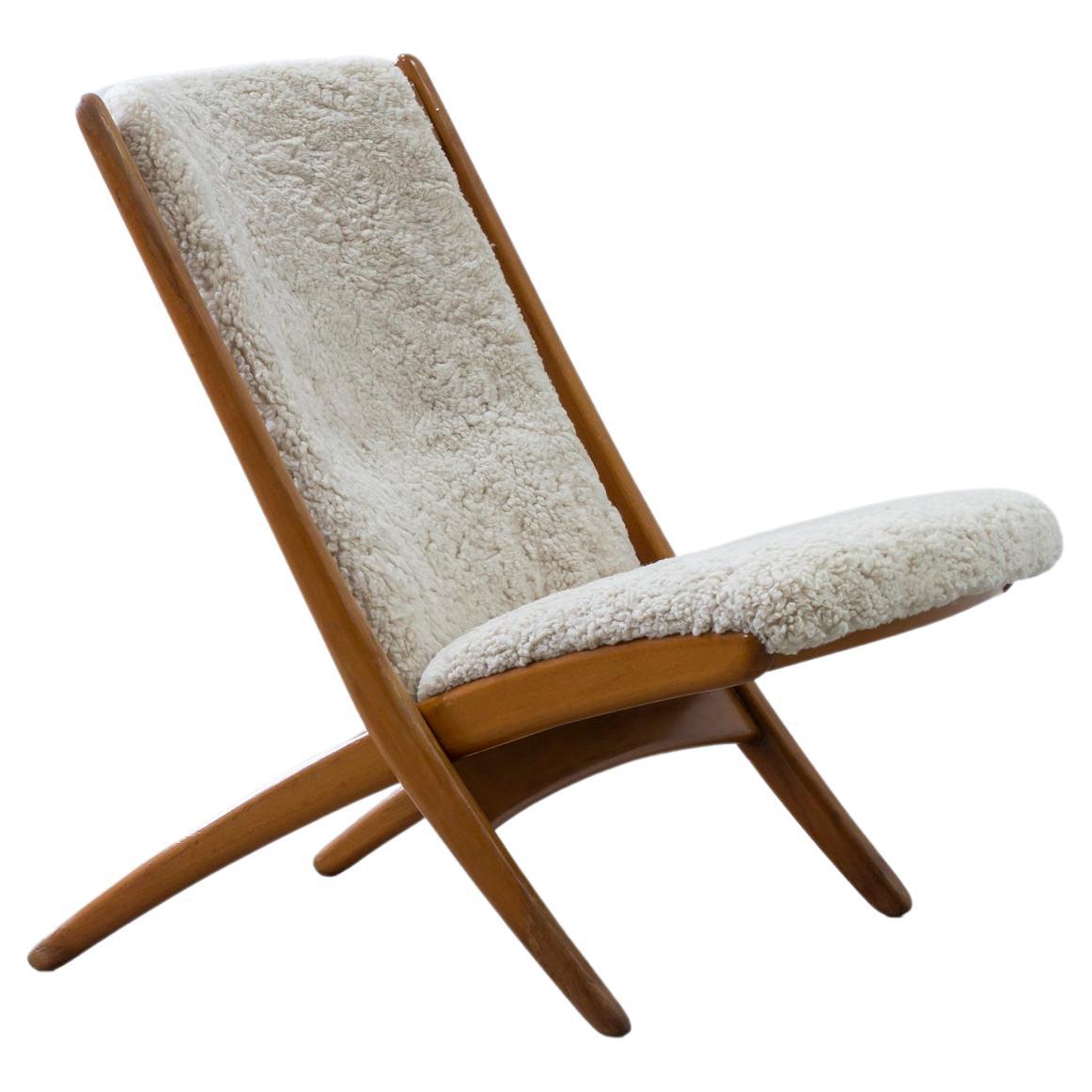 "Nordic" sheepskin lounge chair by Ingmar Relling, Norway, 1950s For Sale