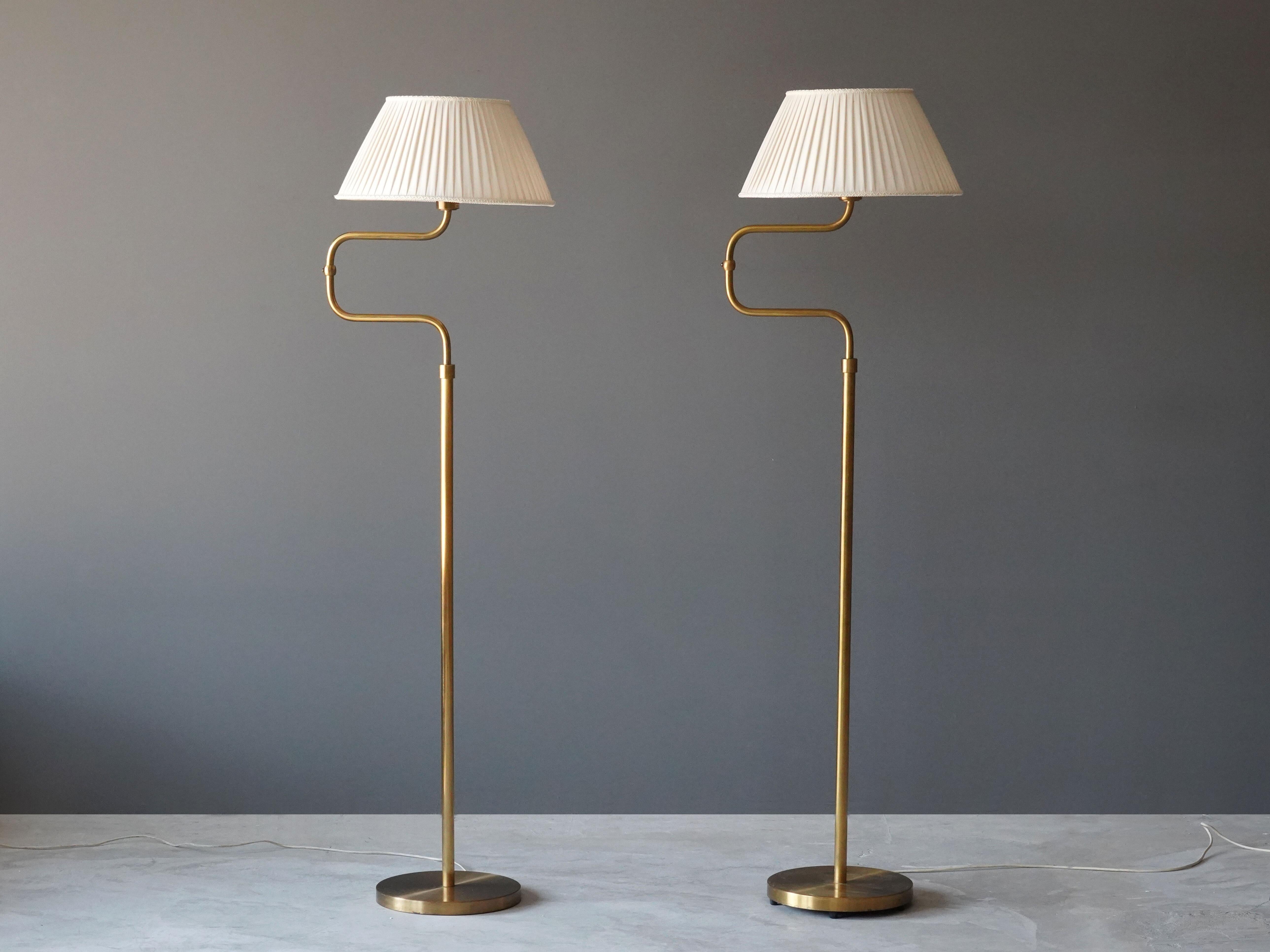 A pair of adjustable modernist floor lamps. Produced by Nordiska Kompaniet, 1940s. Stamped. 

Other designers of the period include Paavo Tynell, Lisa Johansson-Pape, Carl-Axel Acking, and Gunnar Asplund.