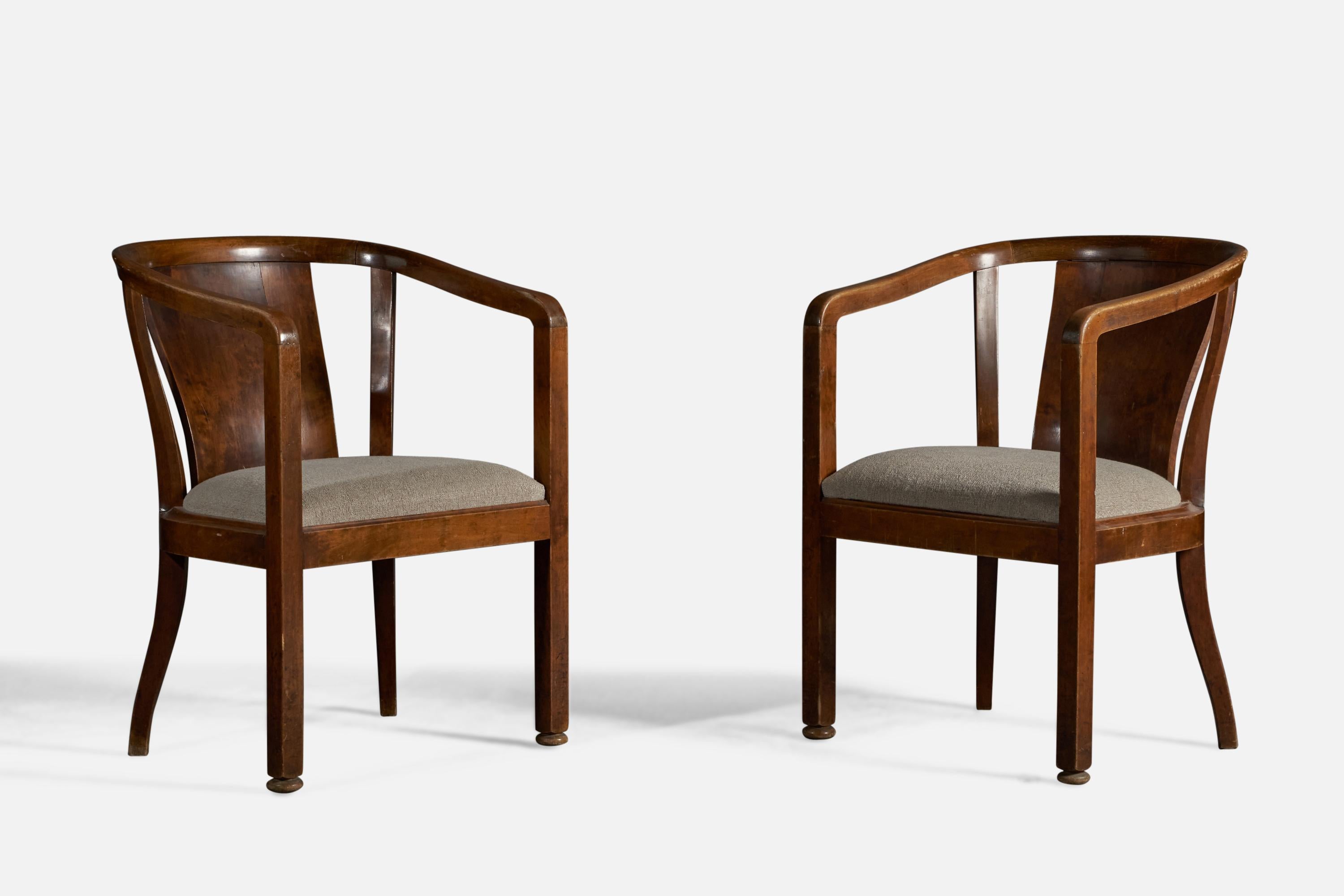 A pair of stained birch and beige fabric, designed and produced by Nordiska Kompaniet for the head office of Systembolaget, Sweden, 1919.

19” seat height
