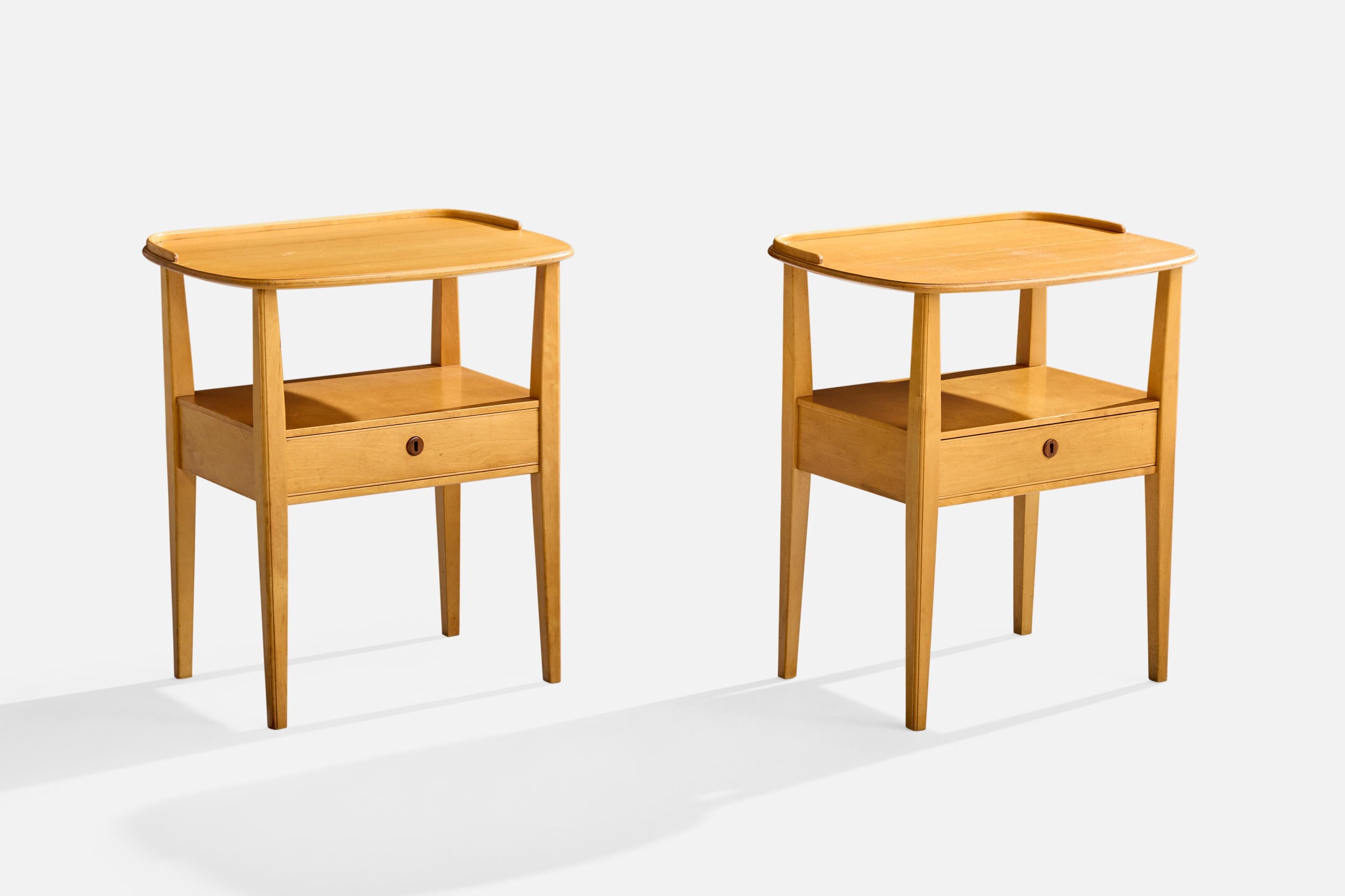 A pair of elm nightstands produced by Nordiska Kompaniet, Sweden, c. 1950s.

Overall Dimensions (inches): 23.875