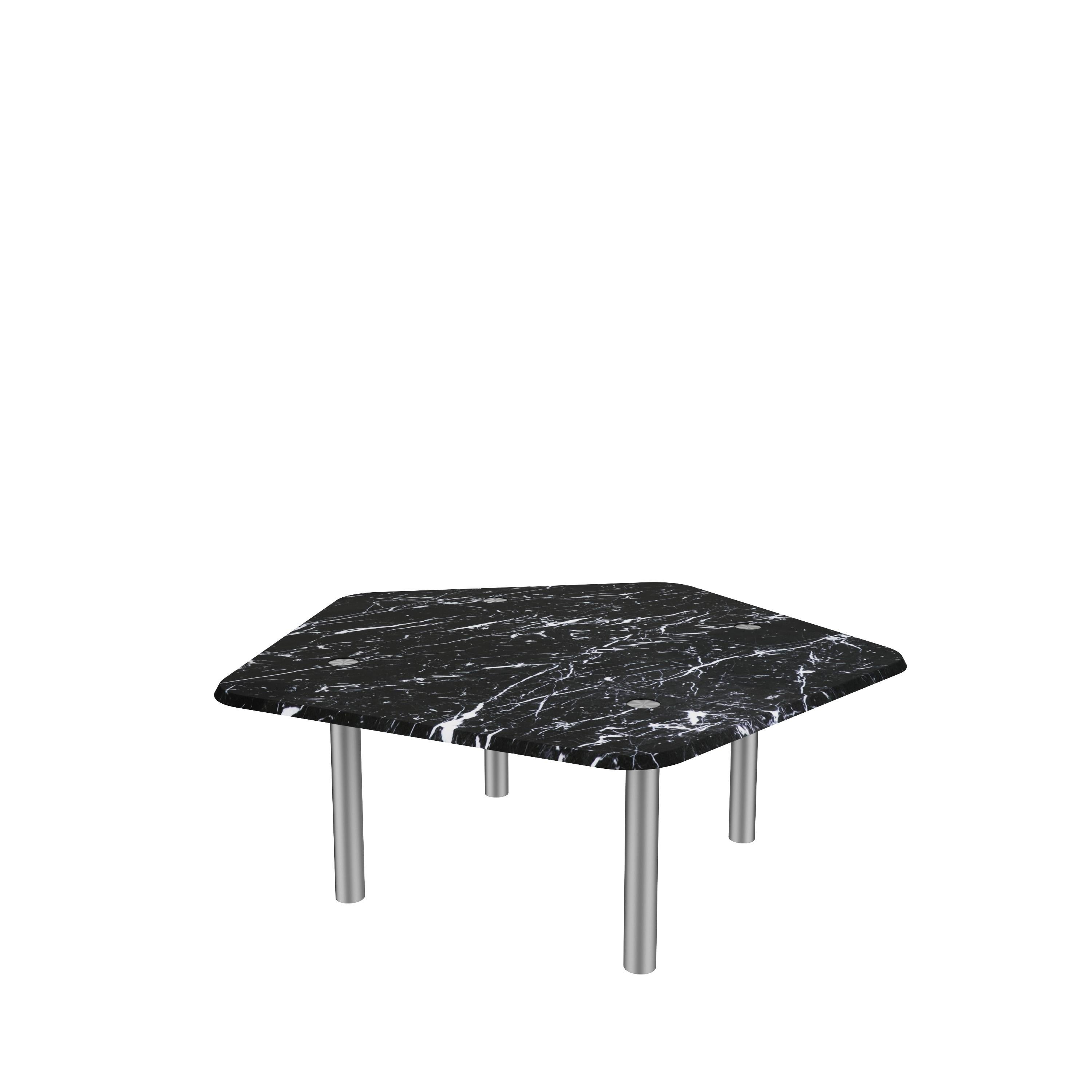 𝗣𝗿𝗼𝗱𝘂𝗰𝘁 𝗗𝗲𝘁𝗮𝗶𝗹𝘀:
Modern coffee table with a pentagonal shape tabletop.Its four legs frame go through the marble tabletop to expose the nicely done metal work on the surface. The different heights of the smaller tables in this