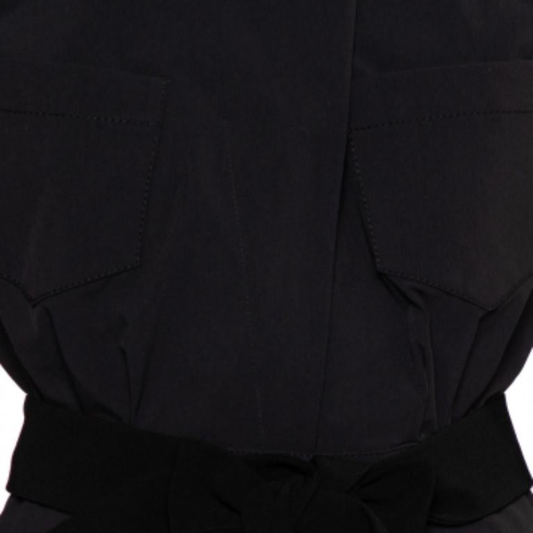 This Norisol Ferrari dress is a reflection of the most contemporary trends in fashion. This black dress is the perfect pick for any casual outing. Designed in quality fabrics into a unique silhouette, this dress is complete with a belt at the waist