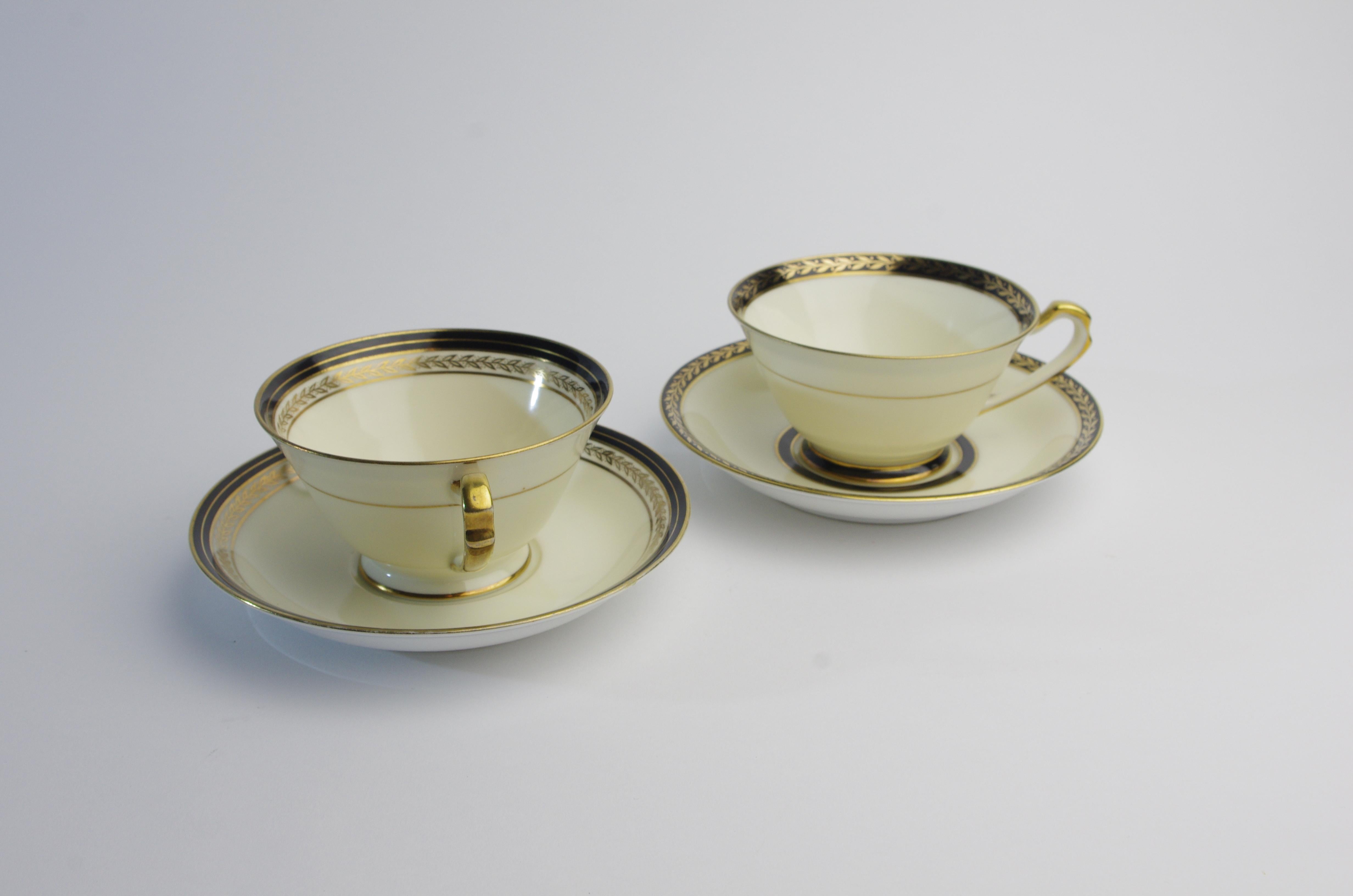 Product description:
Noritake cups are a real collector's item. These two cups and saucers have a classic feel to them with black an gold paintings and a mistletoe-ish pattern. The exact age of the cups and sacuers is difficult to tell, I could not