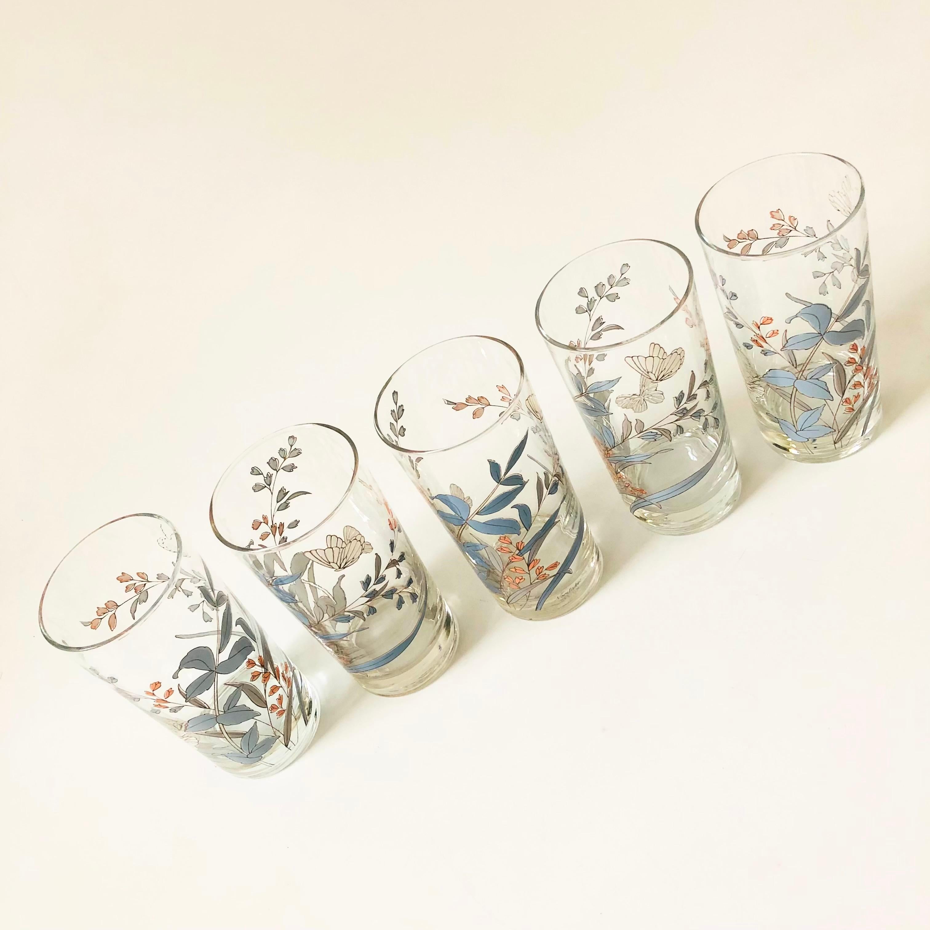 A set of 5 vintage highball tumblers in the Kilkee pattern by Noritake. Beautiful floral designs wrap around each glass in light pink and blue. Each is marked Noritake.

