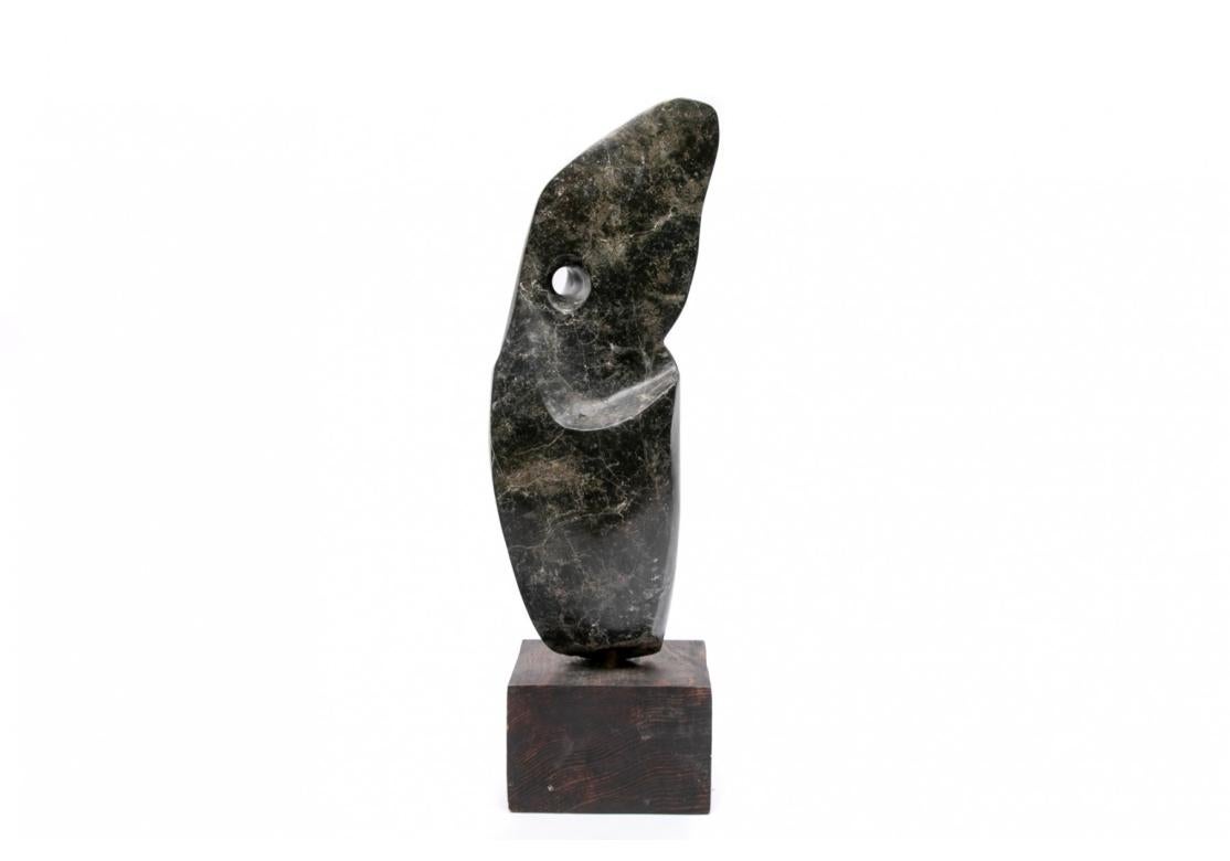 A very finely crafted Abstract Stone  Sculpture by Multidisciplinary Artist Norma Flanagan. Ms. Flanagan was a prolific artist in many mediums including painting, ceramic and stone and was active from the 1960’s to the 1990’s. Her references, as