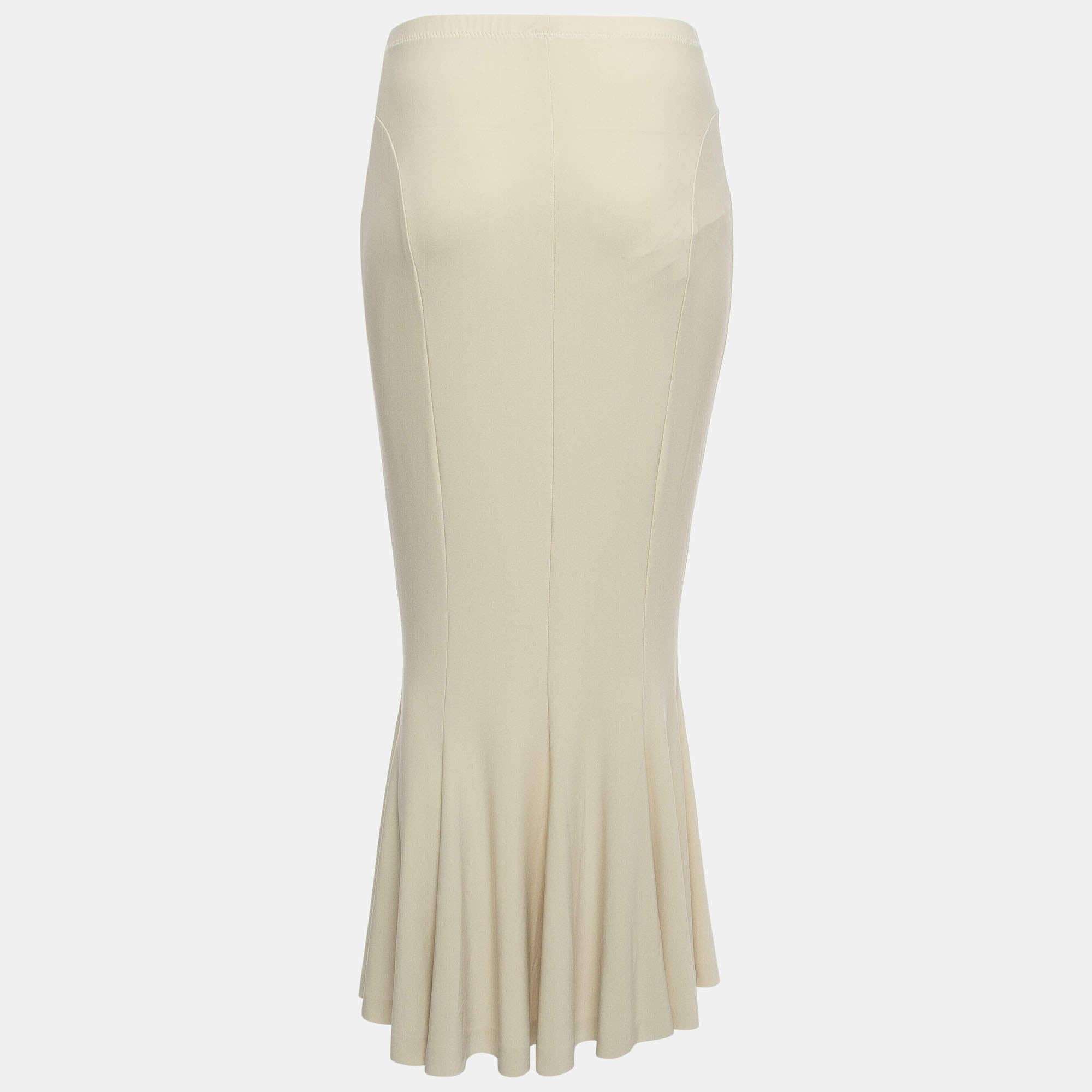This elegant skirt is worth adding to your closet Crafted from fine materials it is exquisitely designed into a flattering shape.