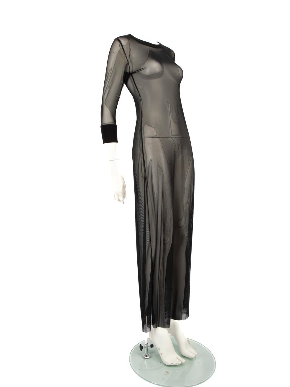 CONDITION is Very Good. Hardly any visible wear to the dress is evident on this used Norma Kamali designer resale item.
 
 Details
 
 
 Black
 
 Synthetic
 
 Dress
 
 Maxi
 
 Mid sleeves
 
 See through
 
 Stretchy
 
 Round neck
 
 
 
 
 
 Made in