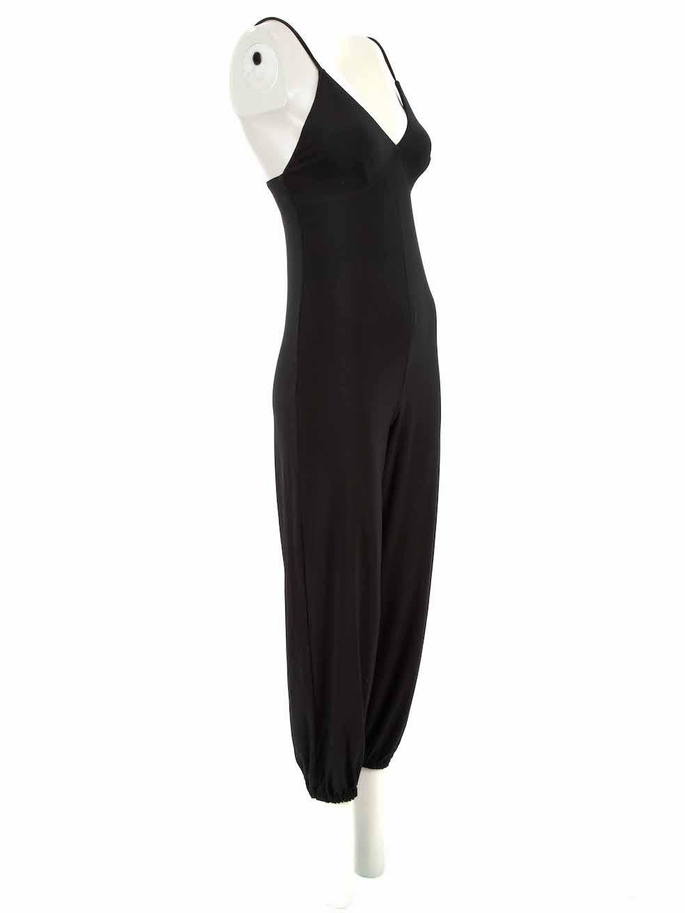 CONDITION is Very good. Hardly any visible wear to jumpsuit is evident on this used Norma Kamali designer resale item.
 
Details
Black
Polyester
Jumpsuit
Sleeveless
Sweetheart neckline
Figure hugging fit
Stretchy
Elasticated cuffed leg

Made in