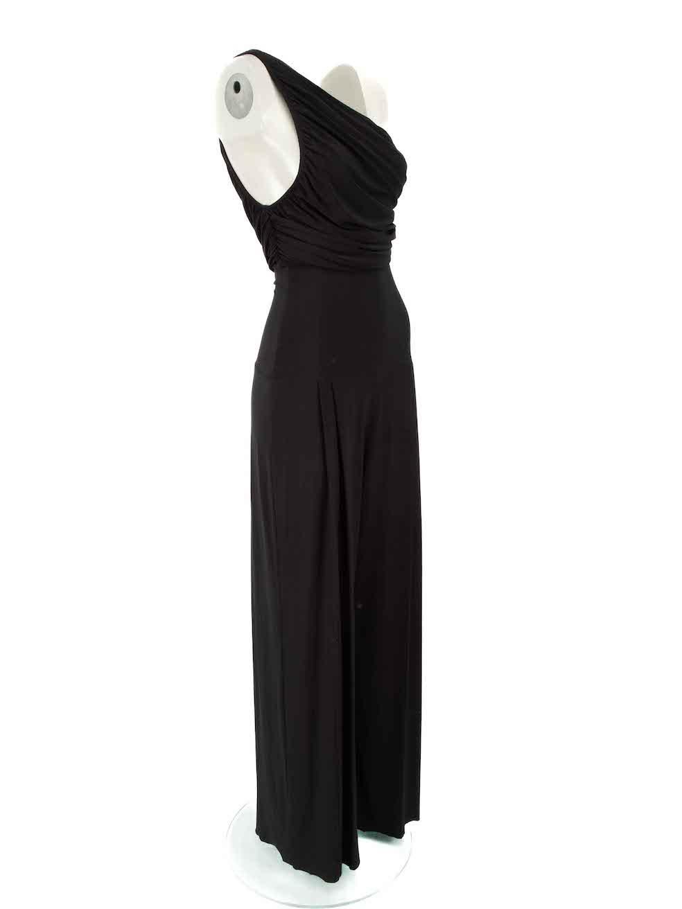 CONDITION is Very good. Minimal wear to set is evident. Minimal wear to the trousers with small hole at the left leg above the cuff and a pluck to the weave at the right leg on this used Norma Kamali designer resale item.

 Details
 Black
