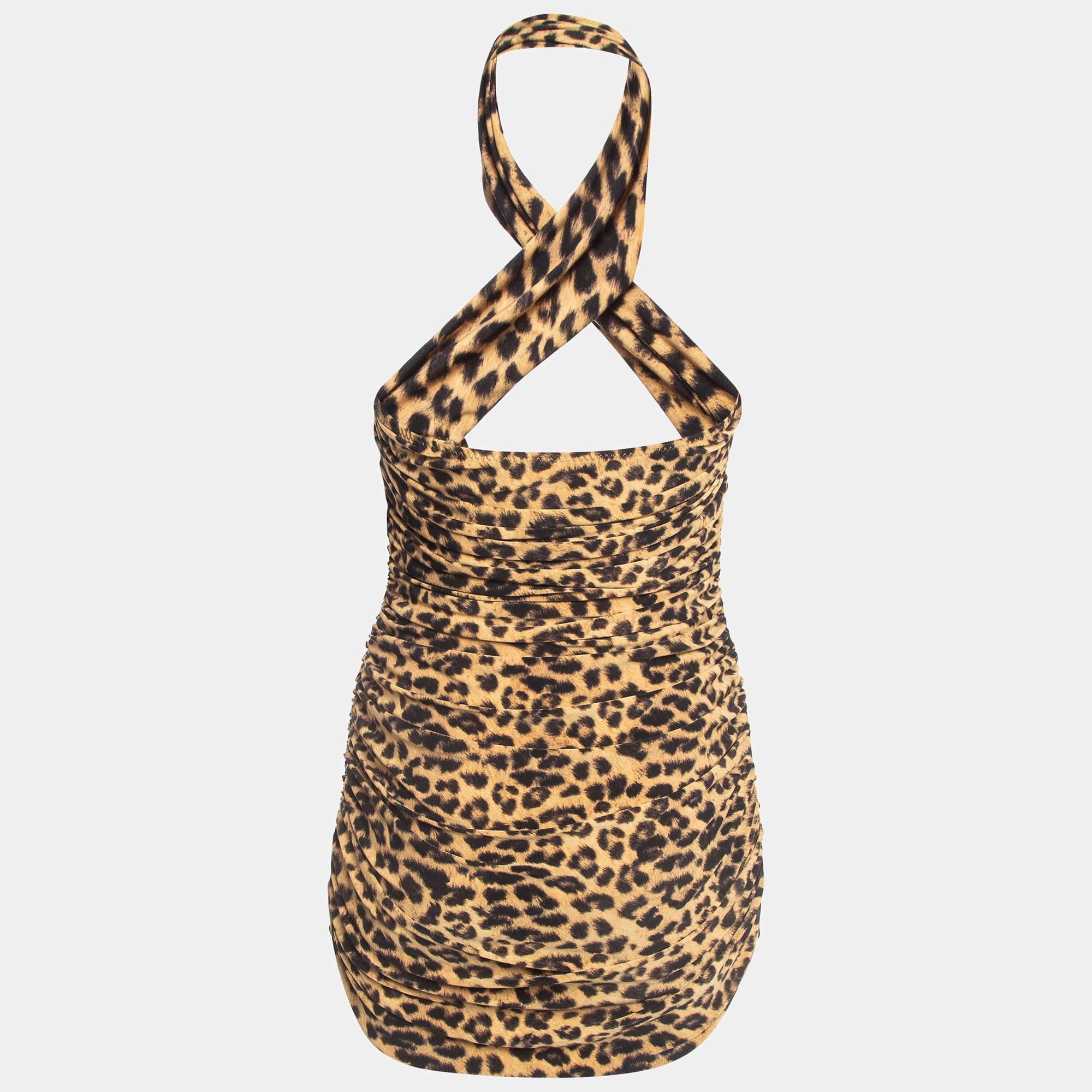 The Norma Kamali leopard print swimsuit is a great pick for your next vacation. It has a lovely neckline and gathered details.
