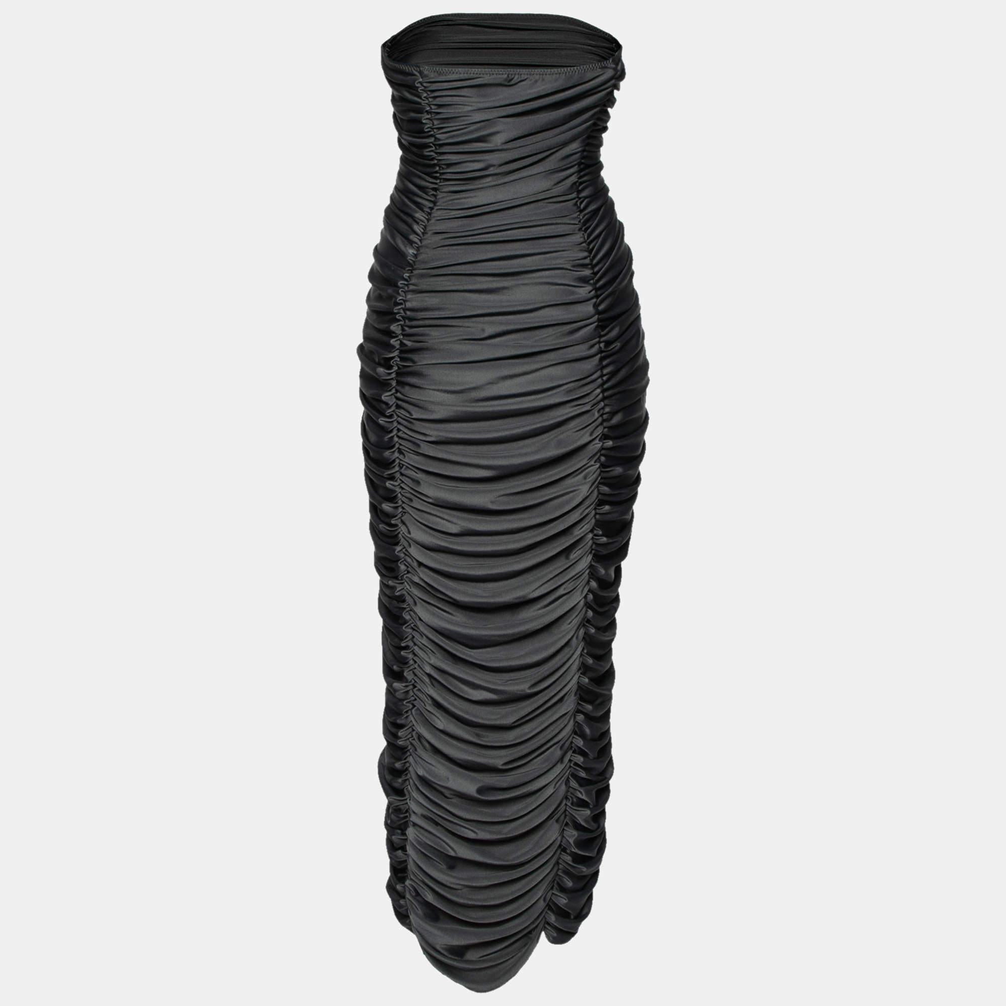 This simple and elegant black dress from Norma Kamali is perfect for those special occasions. It is stitched from fine materials and features a strapless design with gorgeous ruched detailing. Wear it with high heels and a statement clutch to