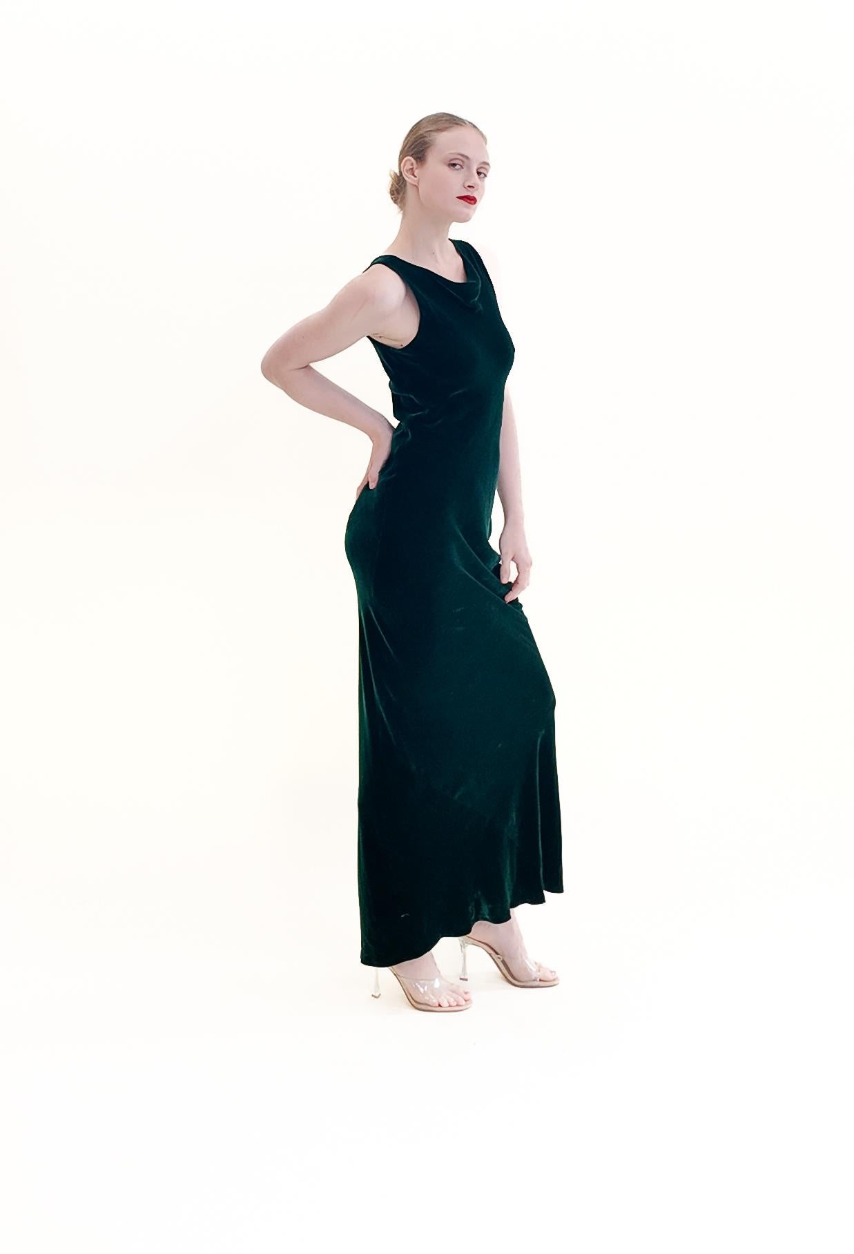 Elevate your style in this Norma Kamali Green Velvet Bias Cut Dress. Designed with a flattering bias cut and crafted from luscious velvet fabric, this deep emerald green dress is perfect for any winter wonderland, holiday party, or even a red carpet
