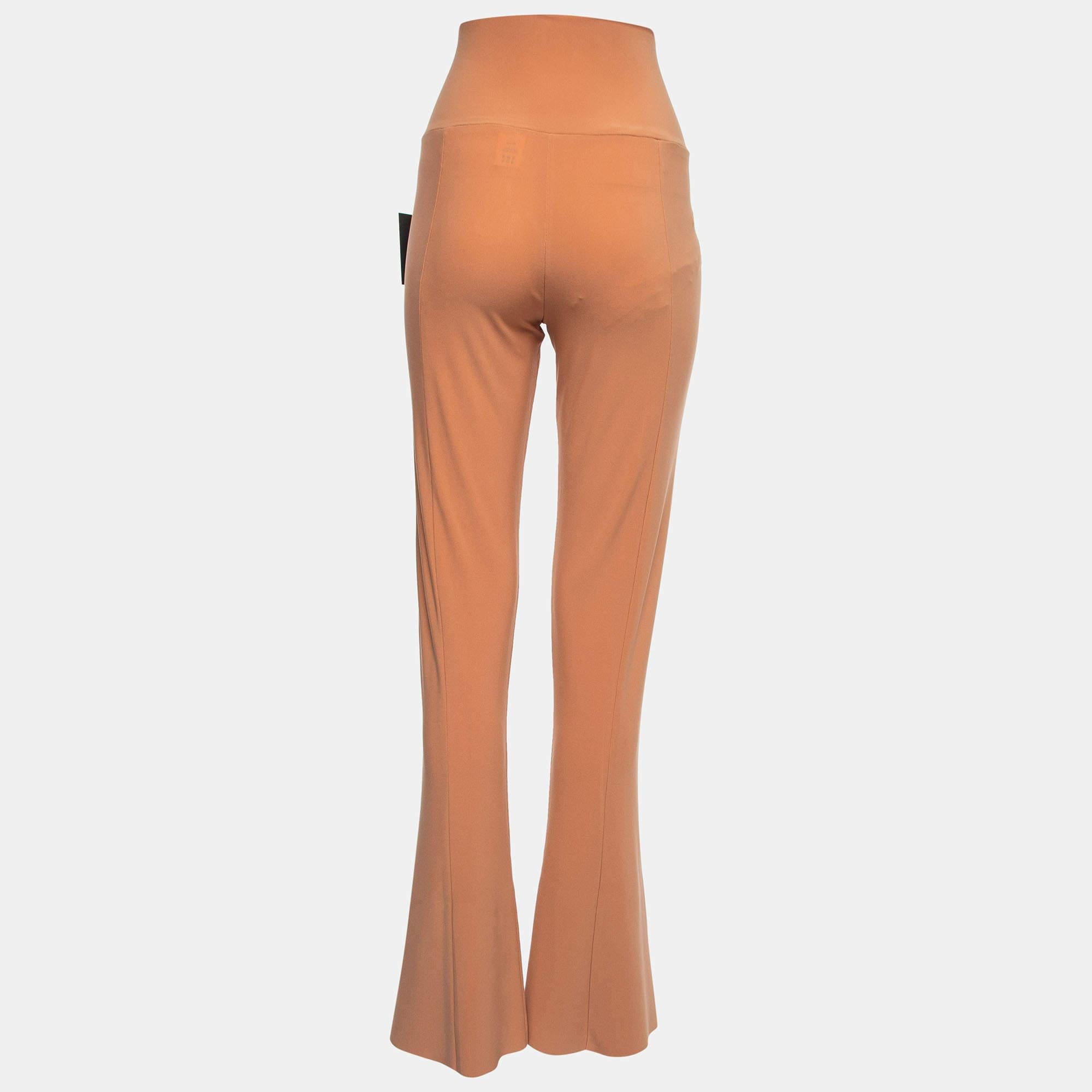 The Norma Kamali leggings are a stylish blend of comfort and fashion. Crafted from stretchy knit fabric, featuring a high waist for a flattering fit, and adorned with an orange color, these leggings are a great pick.

Includes: Brand Tag