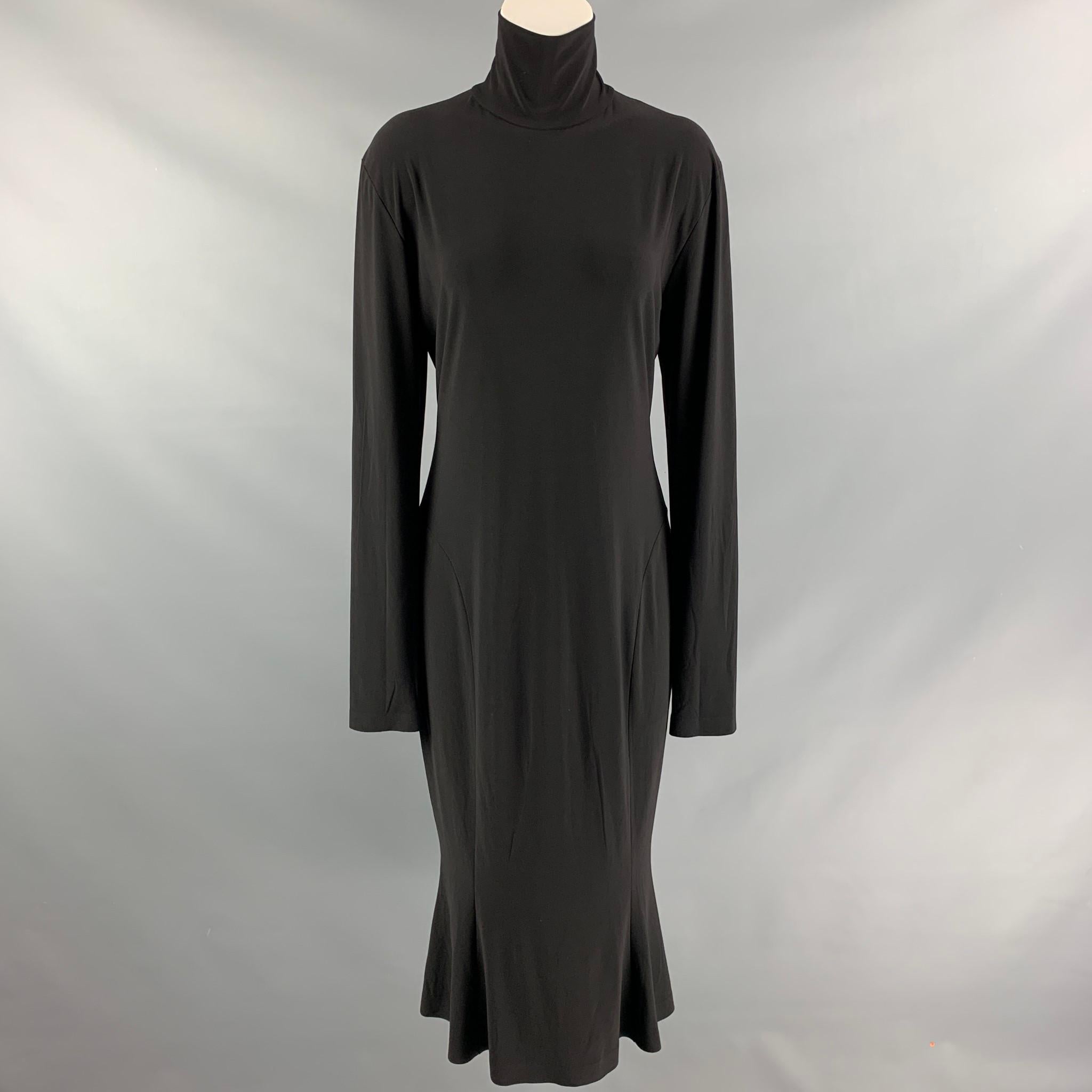 NORMA KAMALI long sleeve fish tail maxi dress comes in black polyester and spandex jersey featuring turtleneck and half zip closure at center back.

New with Tags.
Marked: 40

Measurements:

Shoulder: 18 in
Bust: 40 in
Waist: 34 in
Hip: 40