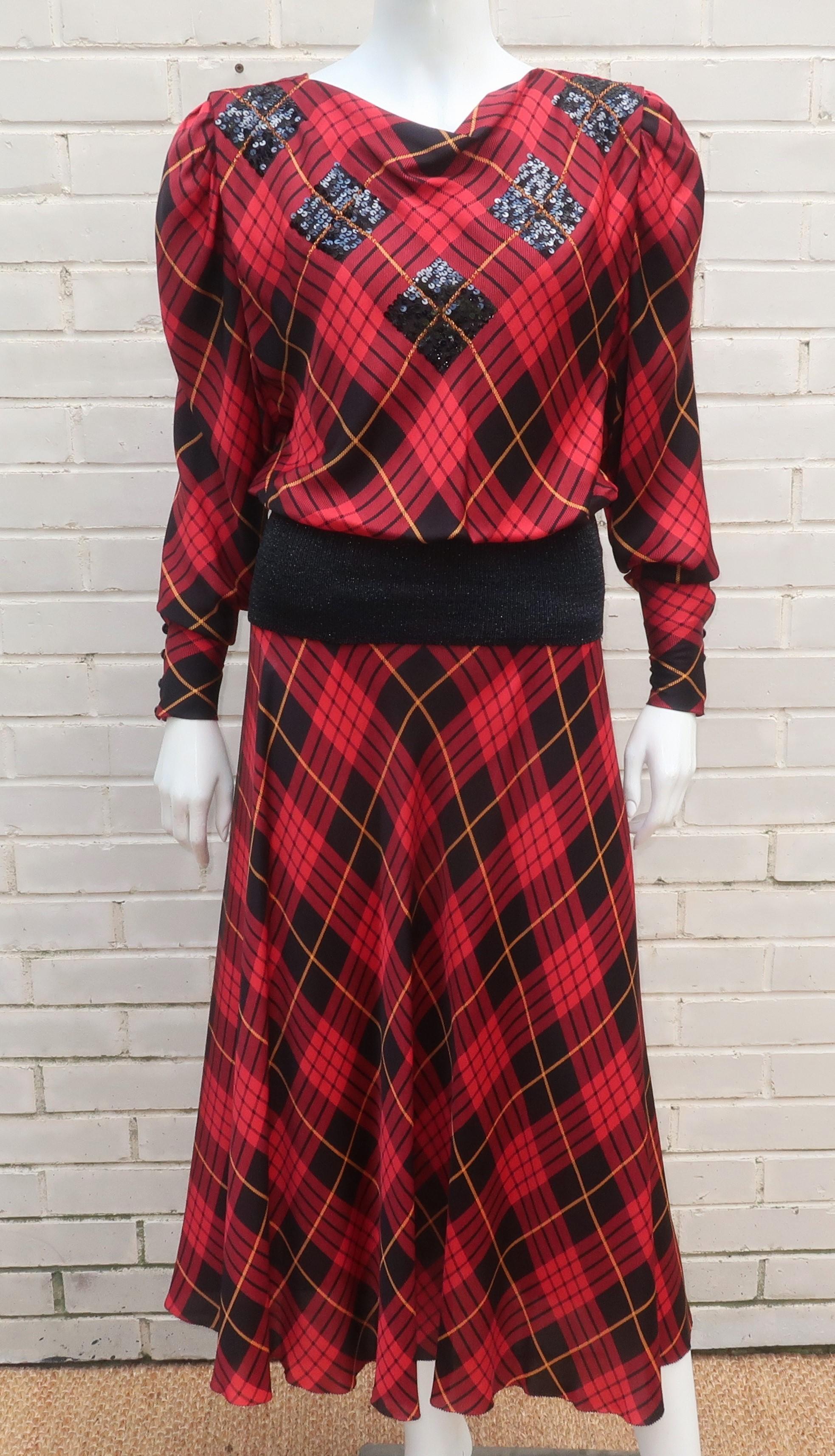 We are mad for plaid!  And it is especially fun when applied to a 1980's Norma Walter's  strong shouldered silhouette and black sequins are added for a little flash of bling.  This two piece silk dress includes a pullover top with built-in knit