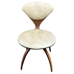 Norman Cherner per Plycraft Sedia girevole Bentwood con rivestimento crema