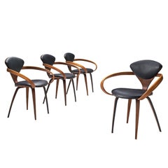 Norman Cherner for Plycraft Four Walnut and Black Leather Dining Chairs