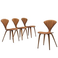 Norman Cherner for Plycraft Four Walnut Dining Chairs