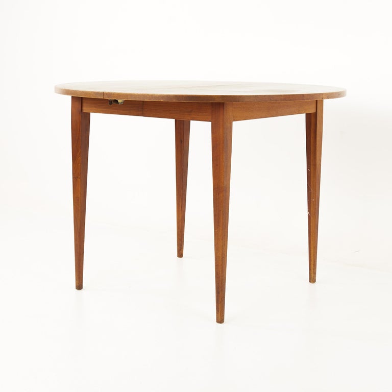 Mid-Century Modern Norman Cherner for Plycraft Mid Century Walnut Round Expanding Dining Table For Sale