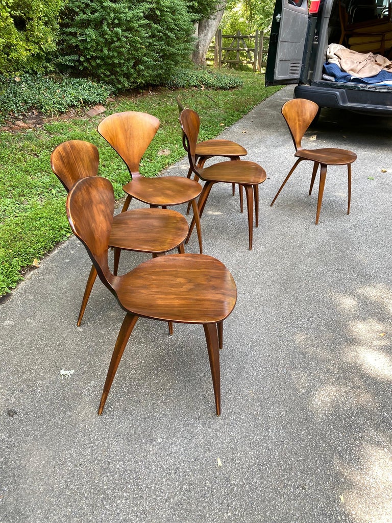 Set of 6 Norman Cherner plycraft walnut dining room chairs. Beautiful rich walnut perfectly patinaed with great color! Nice sturdy Set with no damage to note.