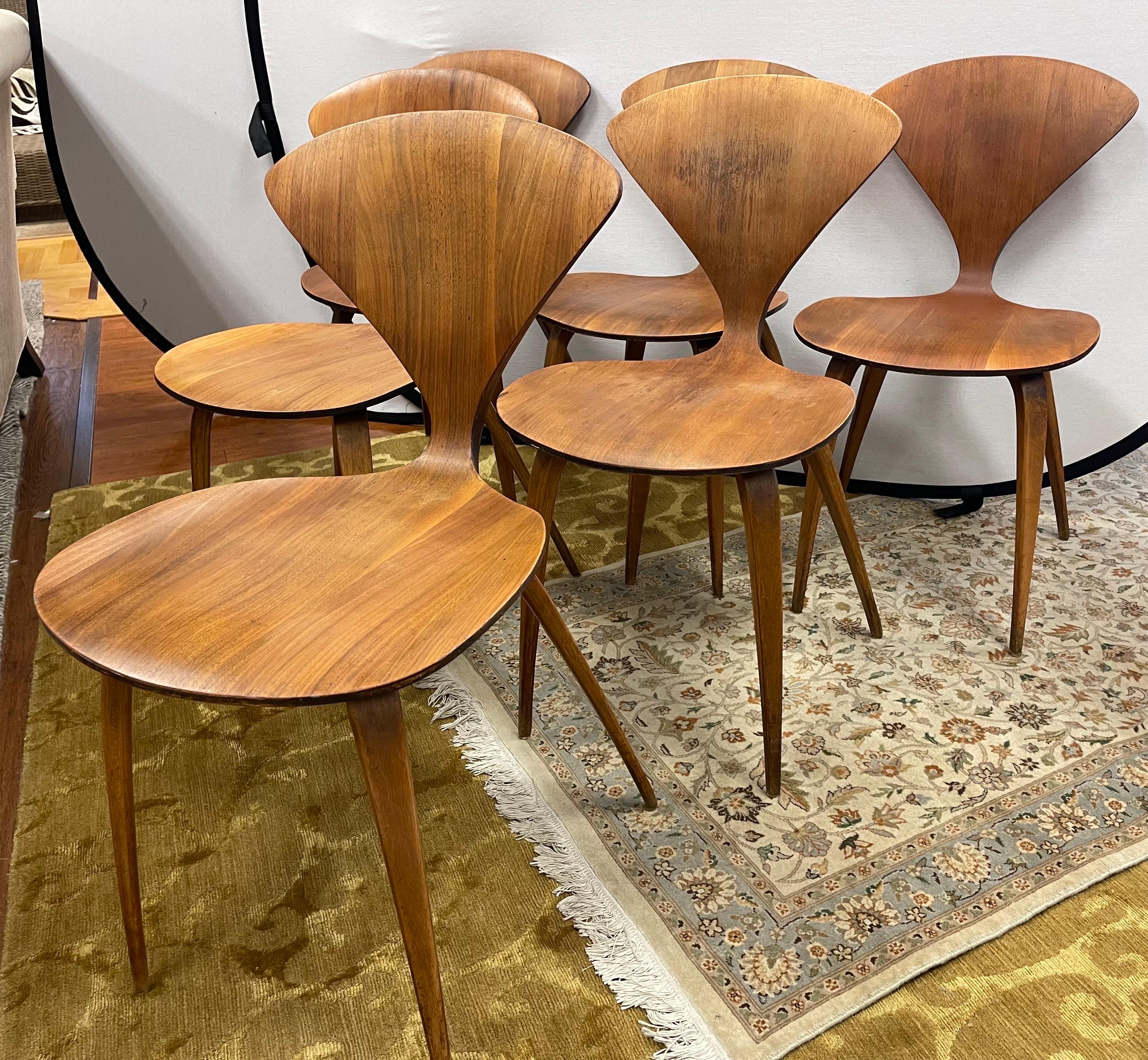 Iconic set of six matching vintage Norman Cherner chairs. Quintessential mid century modern lines and scale. Why not own the best? Please review all pics, they have age appropriate wear as shown.