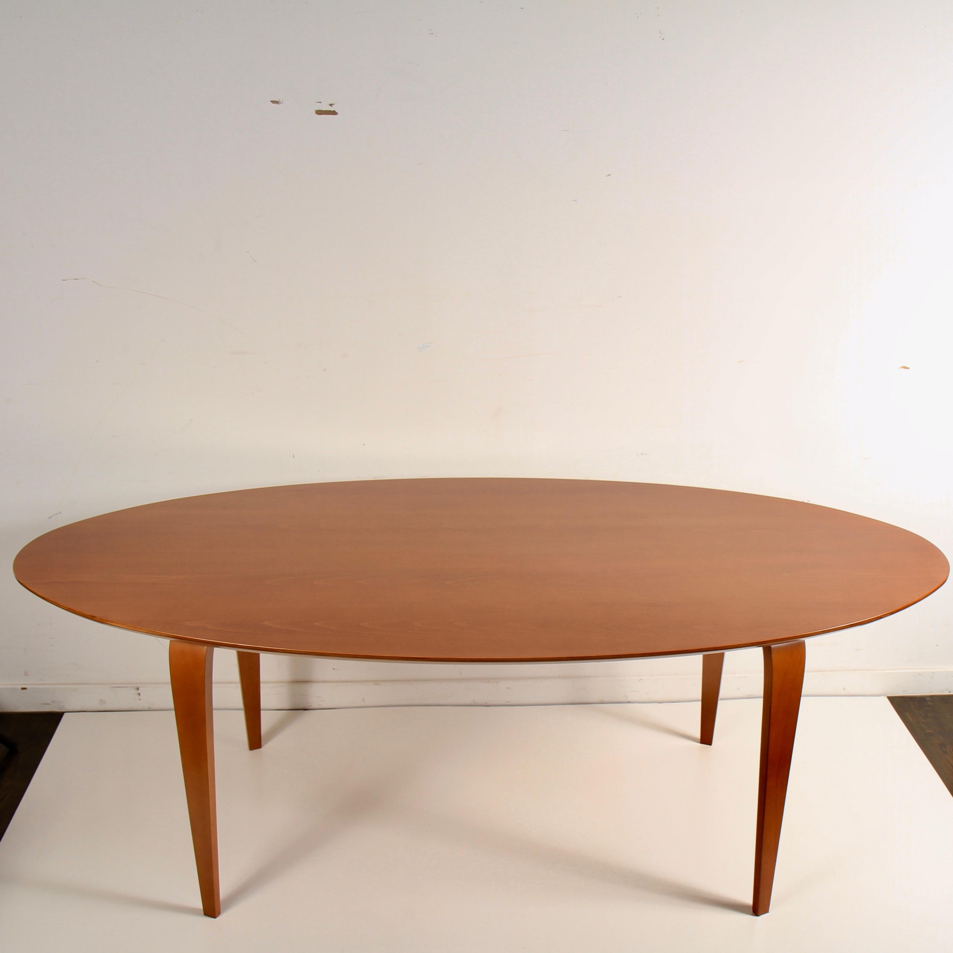 Newly refinished, European beech, molded plywood table by Benjamin Cherner, son of Norman Cherner.

Norman Cherner's sons formed the Cherner Chair Company in 1999 to manufacture and market some of the most recognized designs from their father's