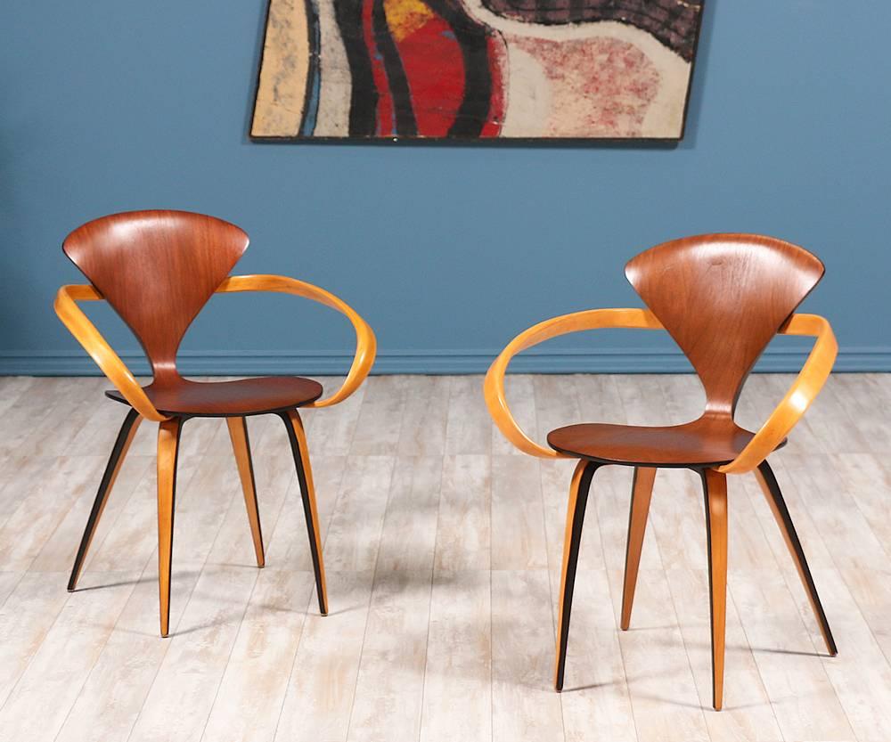 Price Each

Pretzel Arm Chairs designed by Norman Cherner for Plycraft Co. c. 1950’s. Originally designed to make Mid Century Modern design accessible to the masses, this incredible design features walnut-faced molded plywood and laminated birch