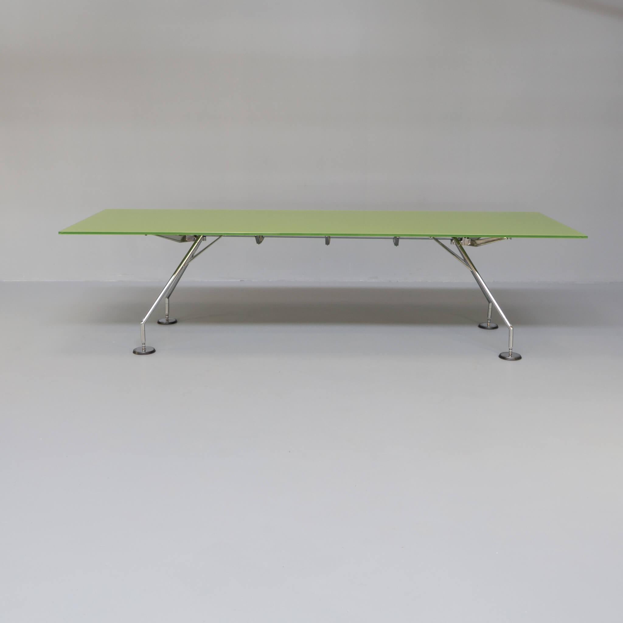 Green Glass office table by Norman Foster for Tecno, in very large 280cm top. Nomos is design by Norman Foster as a solid skeleton with a zoomorphic aesthetic. It can be adapted to satisfy wide range of needs, at home and in the office, from