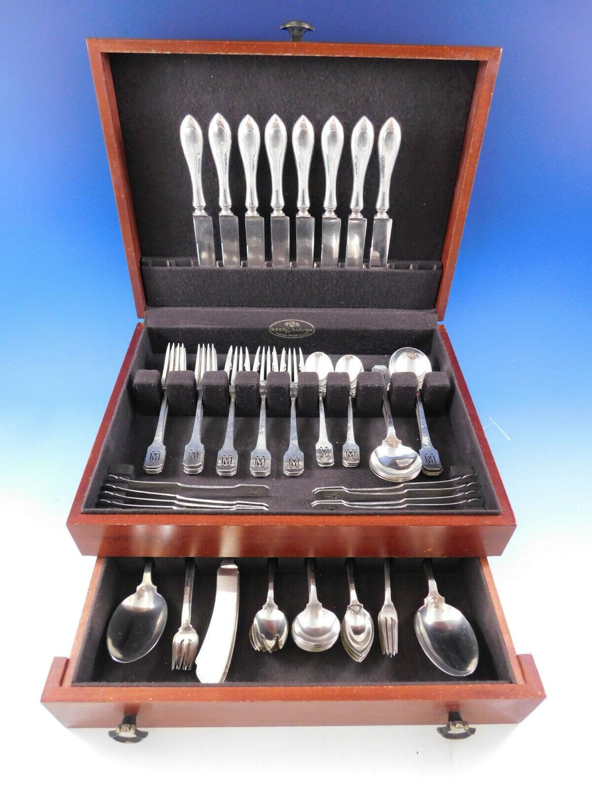 Hervorragendes Norman Hammered by Shreve Besteck aus Sterlingsilber - 77 Teile. Dieses Arts & Crafts-Muster wurde im Jahr 1909 eingeführt. Dieses Set enthält:

8 Messer mit stumpfen versilberten Klingen, 8 3/4