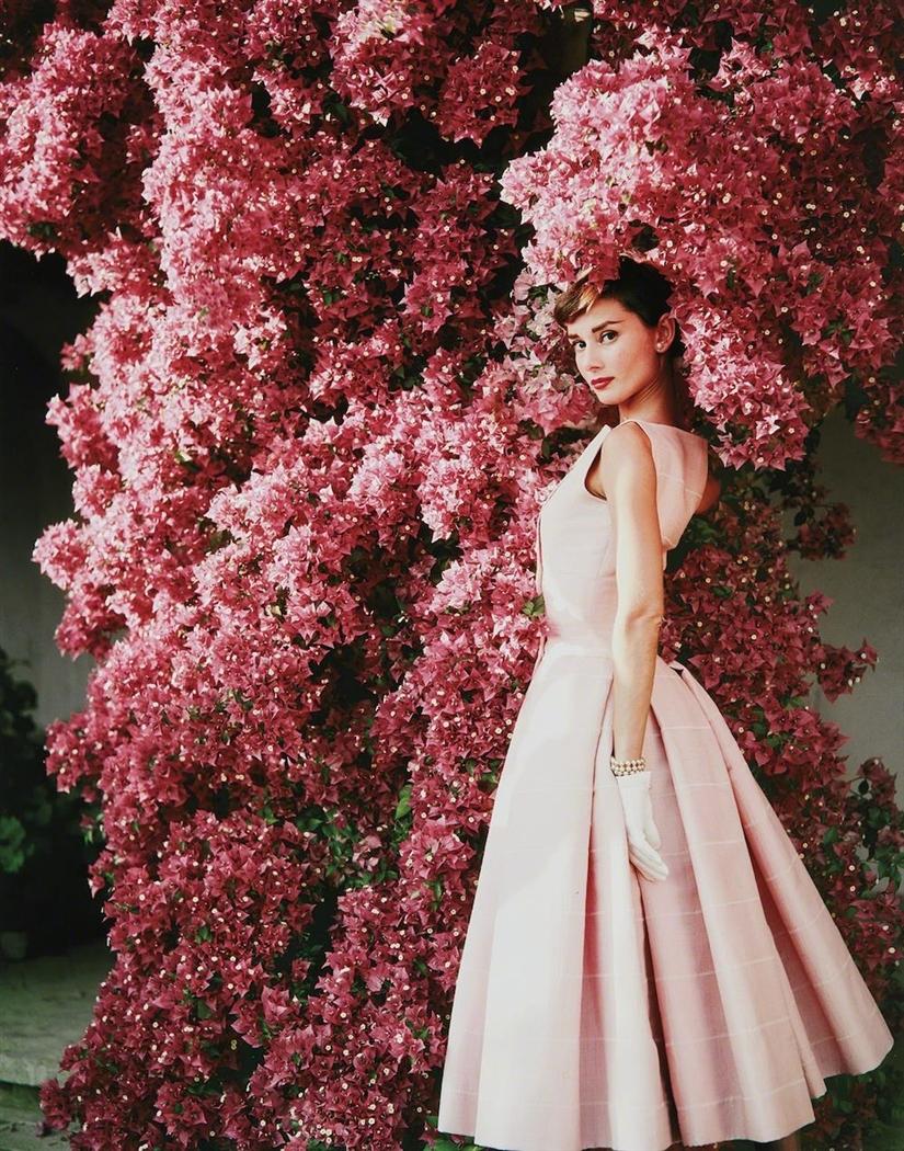 Norman Parkinson Color Photograph - Audrey Hepburn in Givenchy dress at 'Villa Rolli"