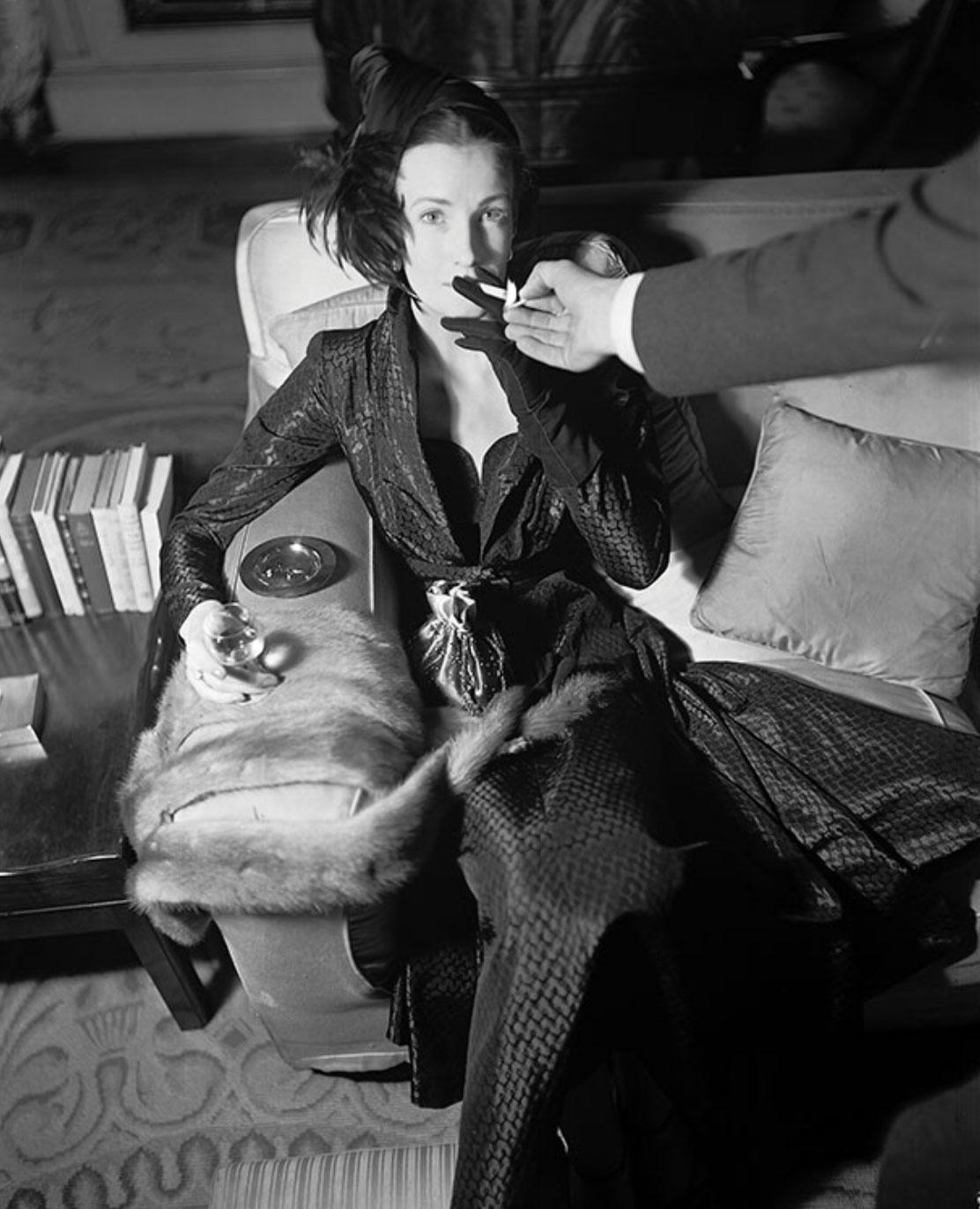 Norman Parkinson Portrait Photograph - Wenda Parkinson in Wallace Smoking