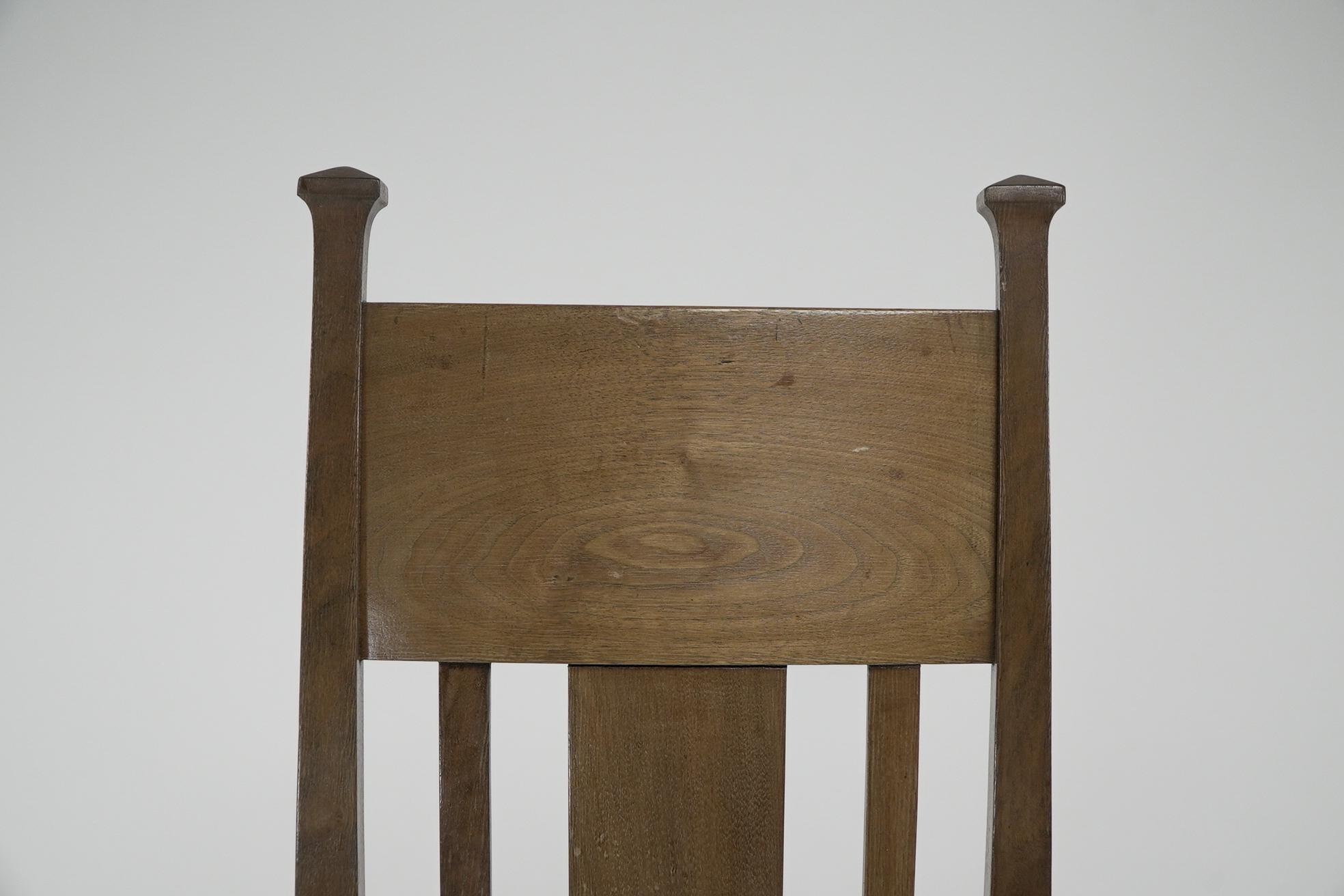 Norman & Stacey (attributed). An Arts and Crafts walnut high back armchair For Sale 11