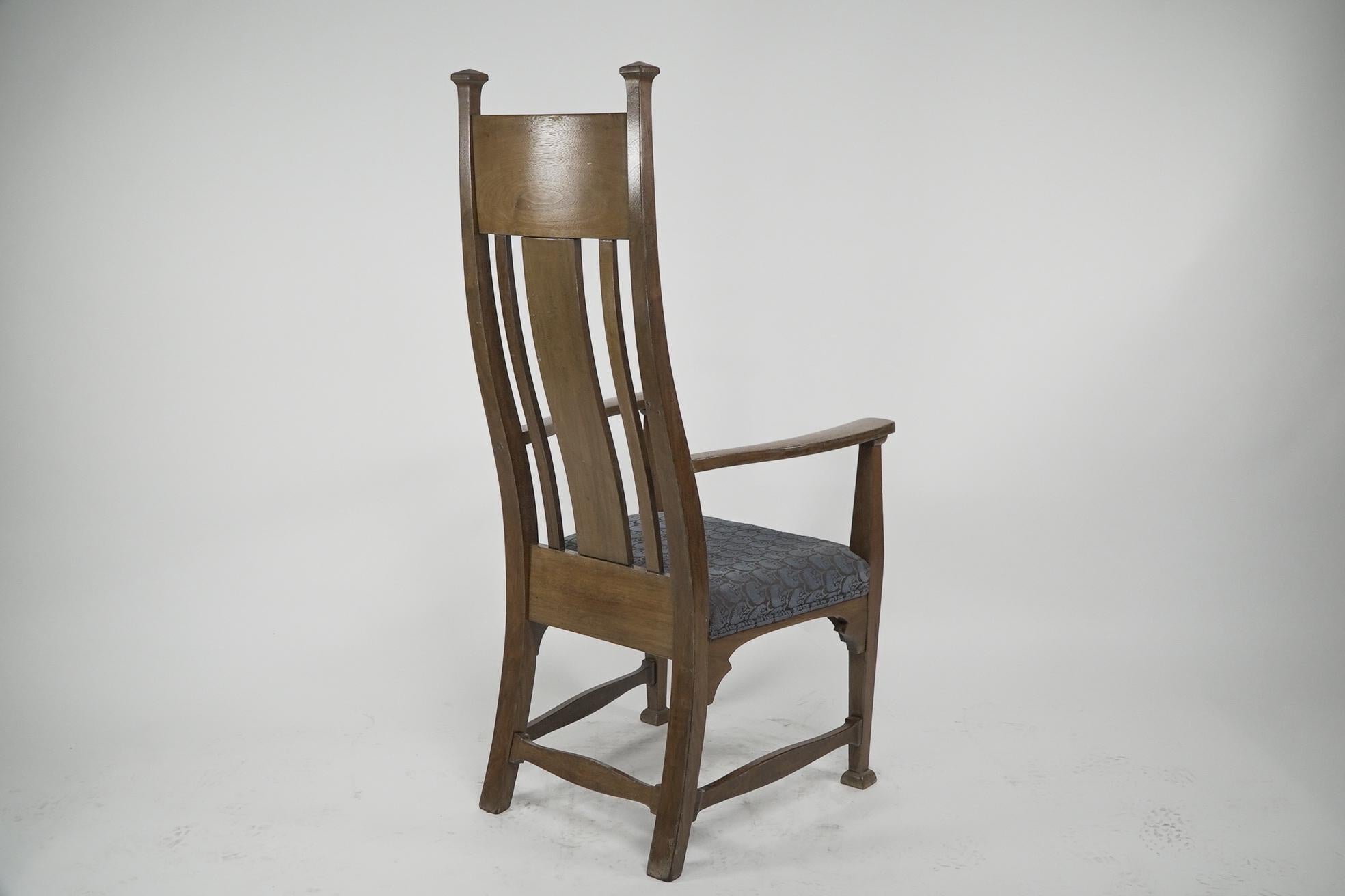 Norman & Stacey (attributed). An Arts and Crafts walnut high back armchair For Sale 12