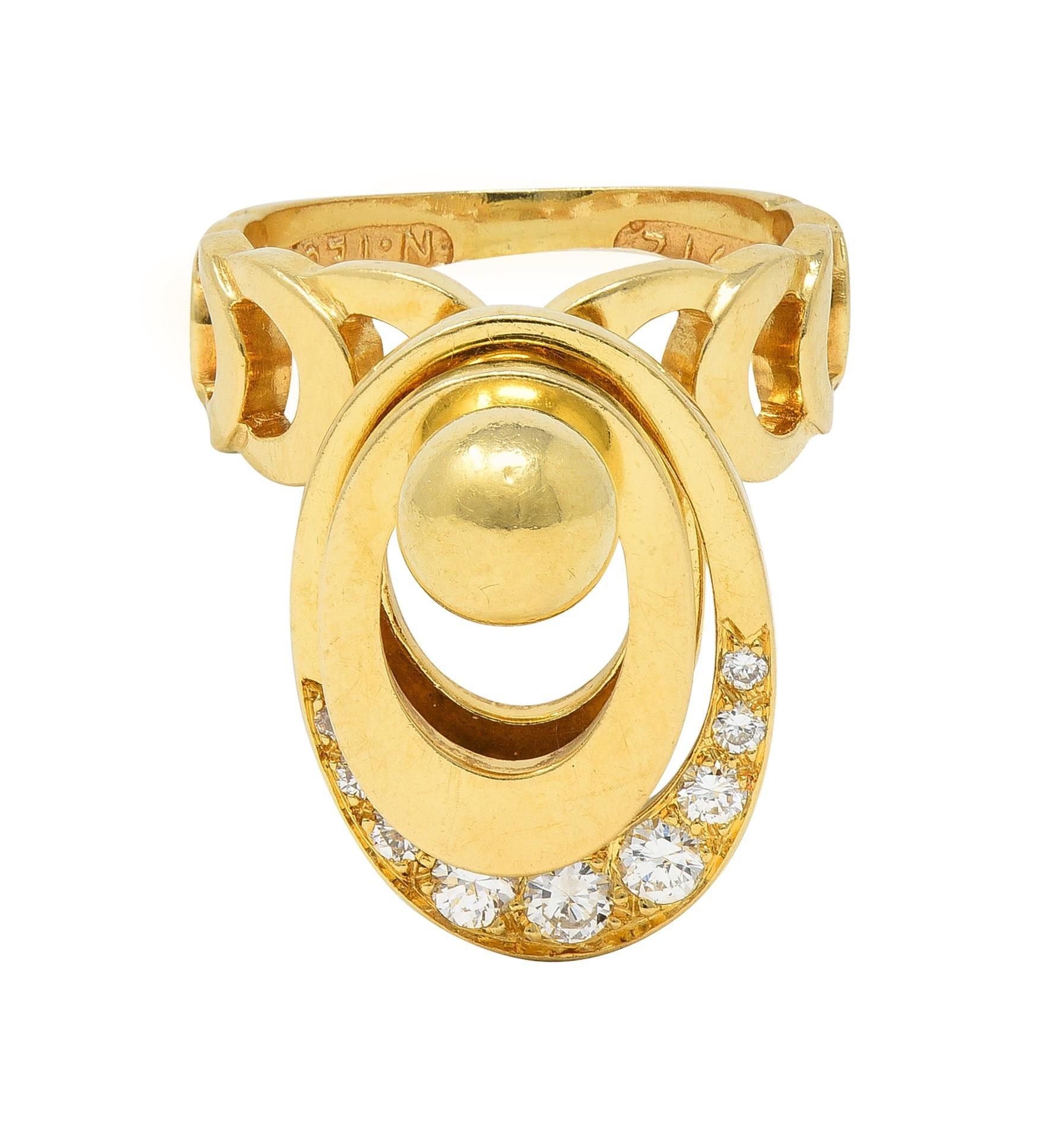 Featuring three oval-shaped rings pierced and stacked on a post - spinning with kinetic movement
Featuring round brilliant cut diamonds bead set on middle oval 
Weighing approximately 0.32 carat total - G color with VS clarity
Completed by pierced