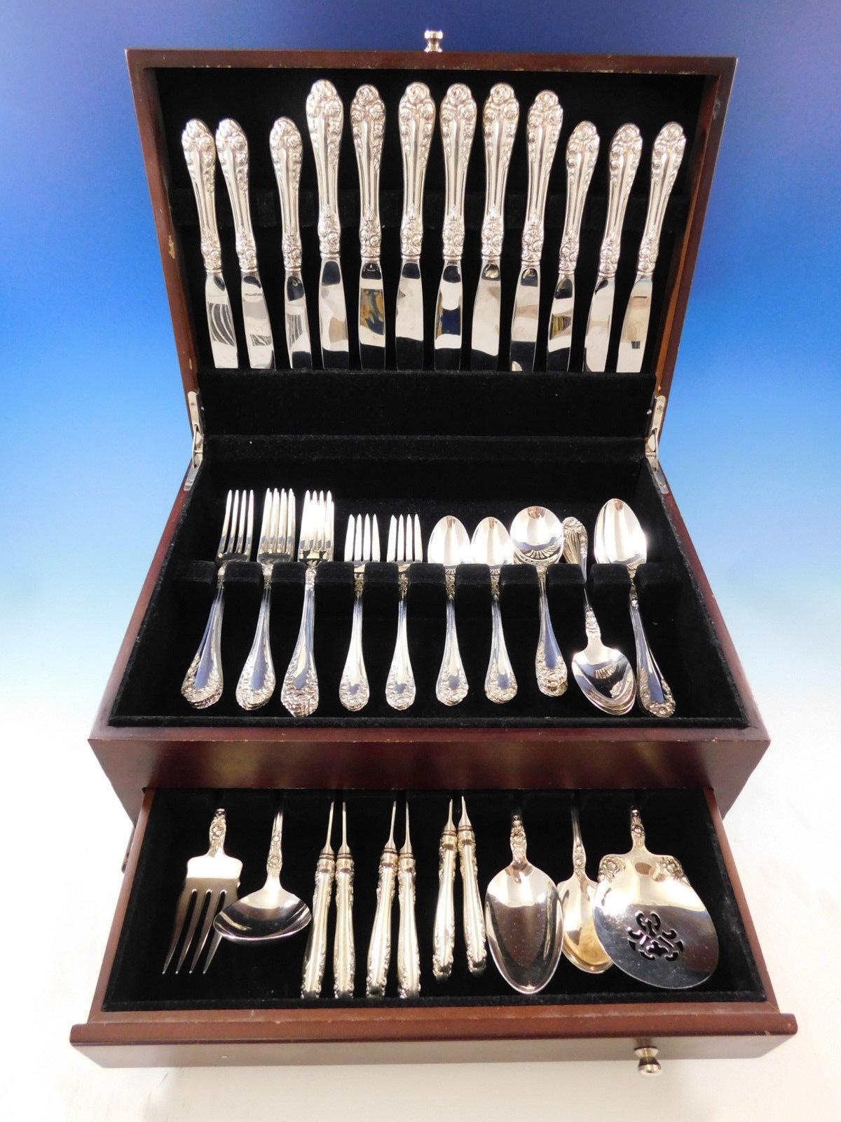 Superb dinner and luncheon Normandie by Northumbria Canada rose motif sterling silver flatware set 59 pieces. This set includes:

Six dinner size knives, 9 7/8