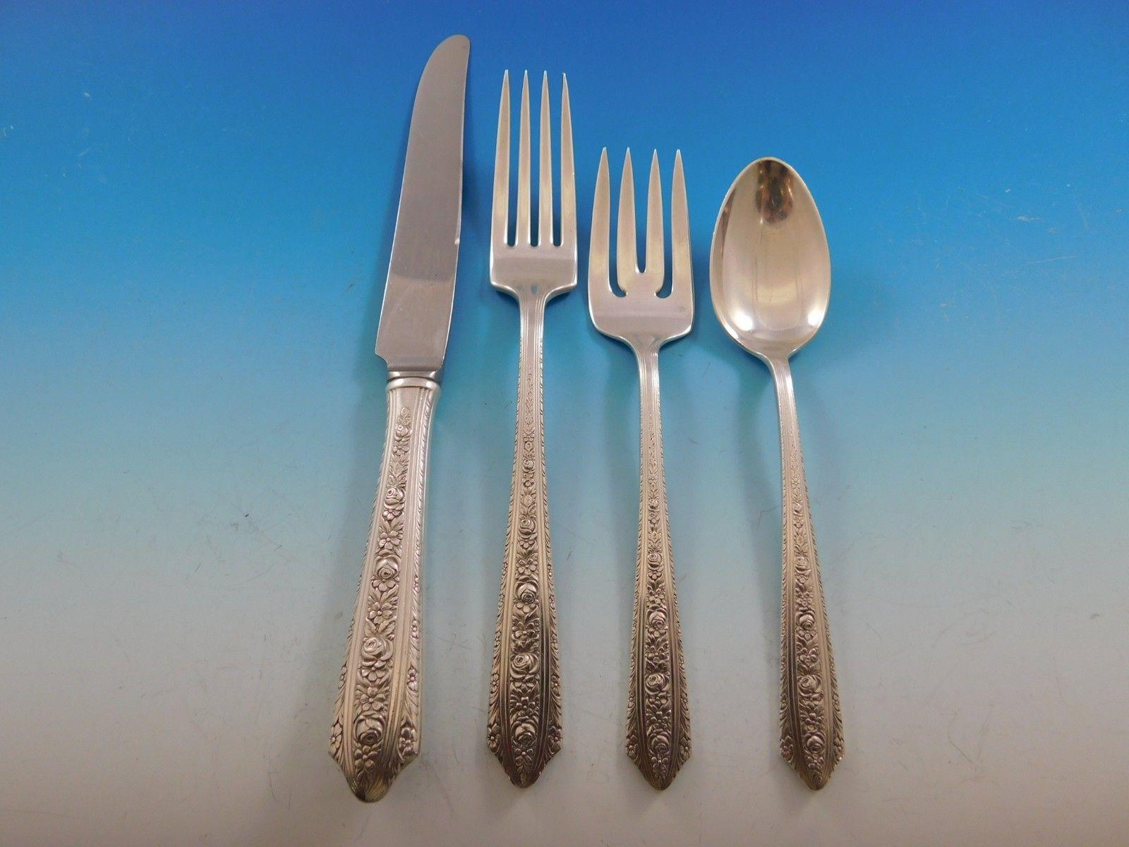 Beautifully designed Normandie by Wallace silver flatware set, 67 pieces. This set includes:

Eight knives, 8 3/4