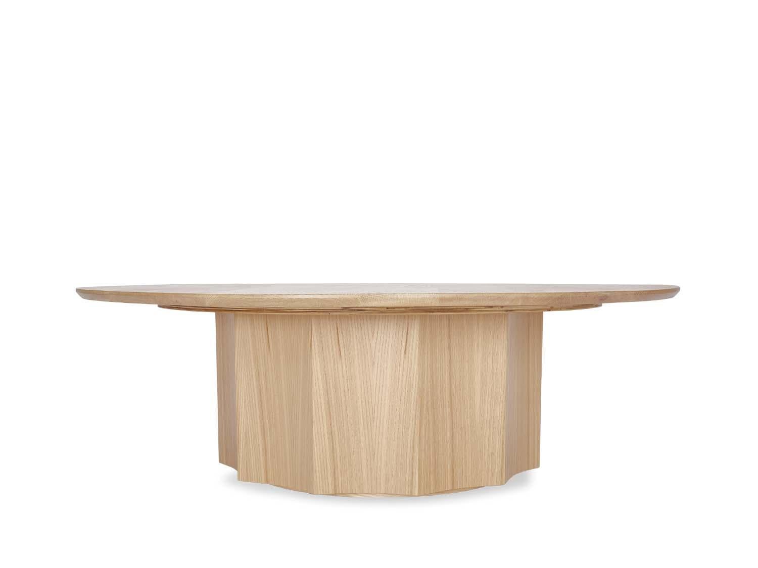The Normandie cocktail table with wood top is a variation of our stone top Normandie Cocktail table. It features an American walnut or white oak fluted base with a sturdy wood top. Available in three sizes. Shown here in 48
