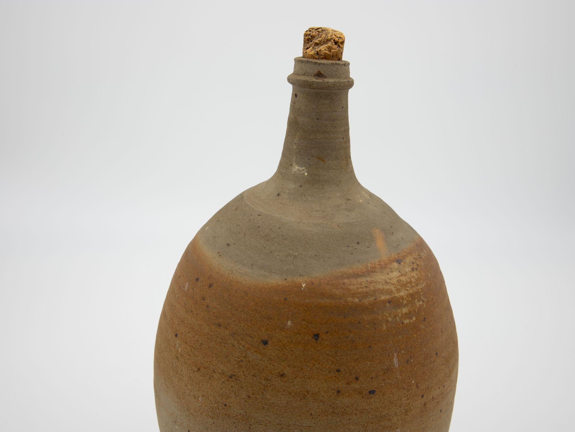 Late 19th century French earthenware pottery bottle or jug from Normandy. Originally used for water or cider.