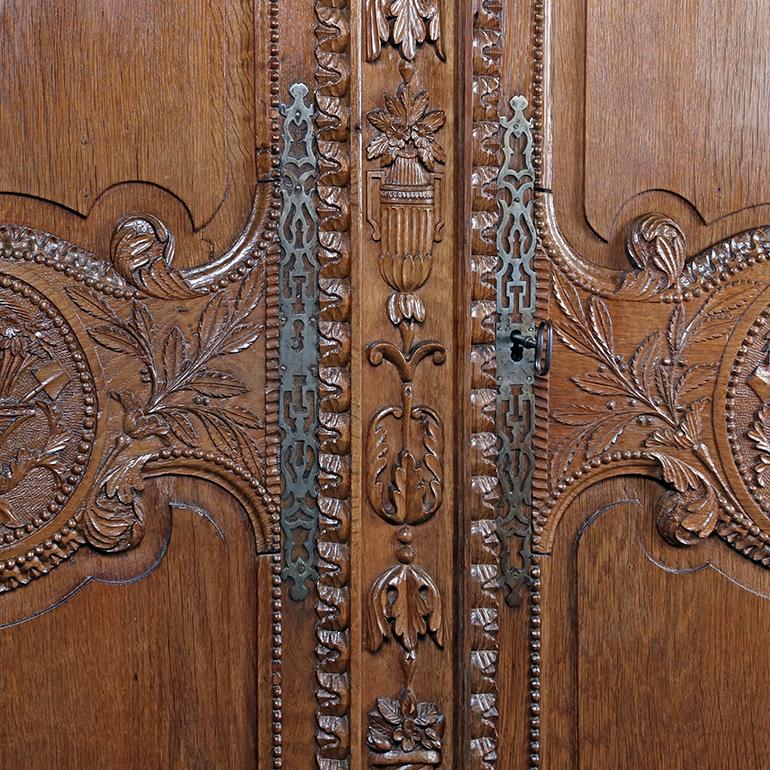 Oak Normandy Style Armoire with Incredible Carved Detail For Sale
