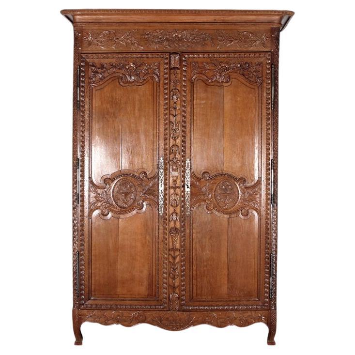 Normandy Style Armoire with Incredible Carved Detail For Sale