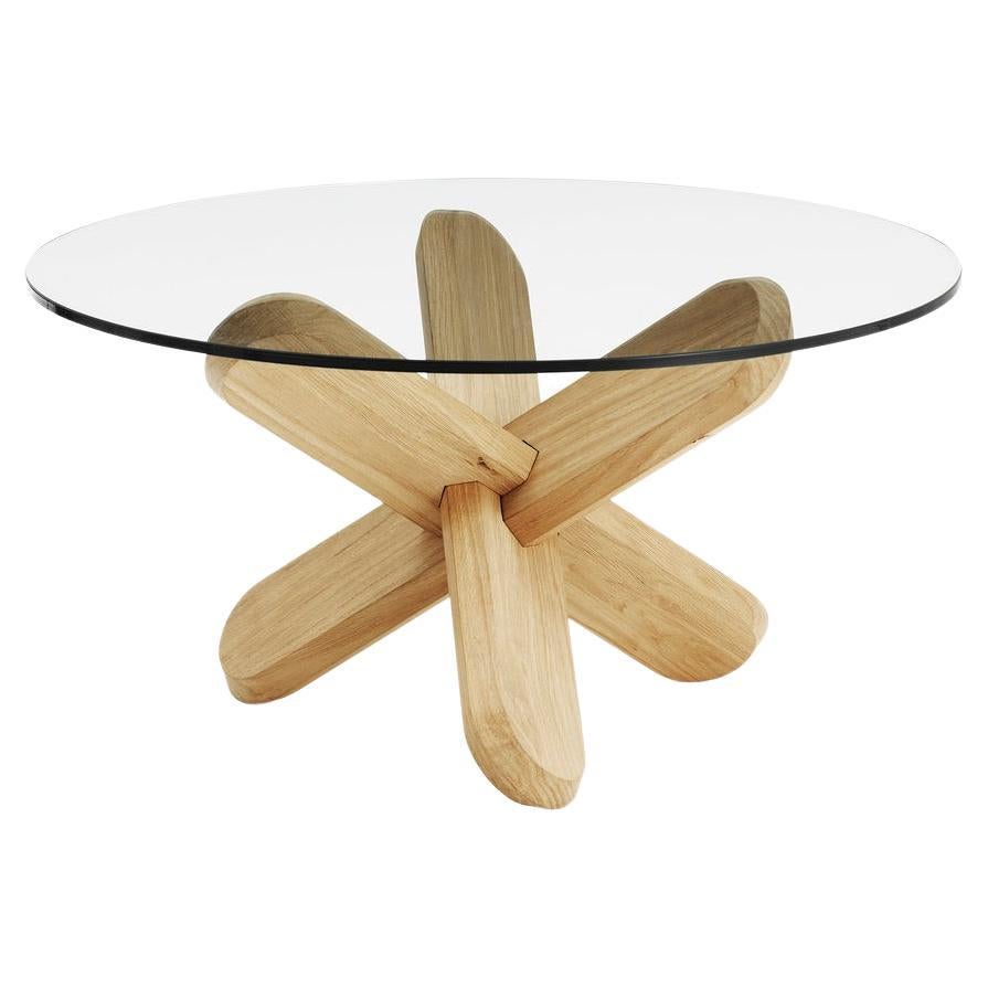 The Ding table comes flat packed. The legs interlock easily by following the included manual. The legs have chamfered edges making the table stand sturdily on the floor and the round 12 mm thick sheet of glass rest solidly on the base.
Ding