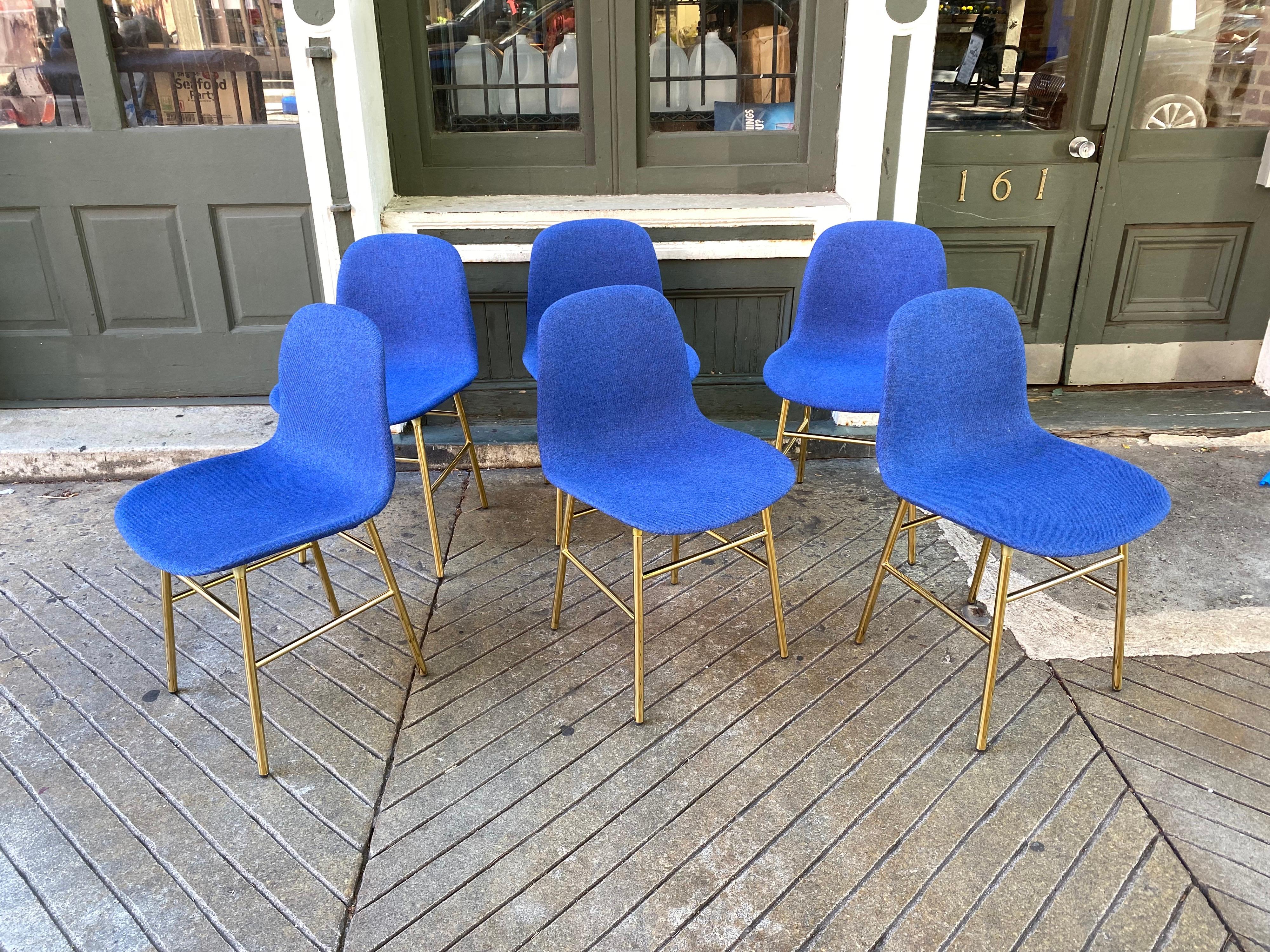 Normann Copenhagen set of 6 upholstered dining chairs with brass legs. Newer Production, looking brand new! Designed by Simon Legald, made in Denmark.