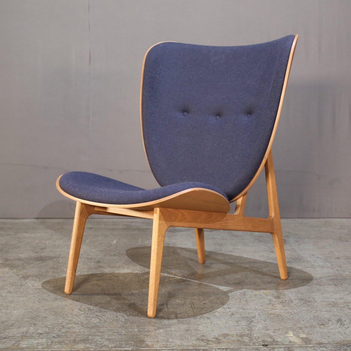 Voici la chaise Elephant Lounge Blue Chair de Norr11, un ajout étonnant à tout espace de vie luxueux. Fabriquée avec les matériaux les plus nobles, cette chaise affiche un design épuré et moderne. L'assise confortable et spacieuse est parfaite pour