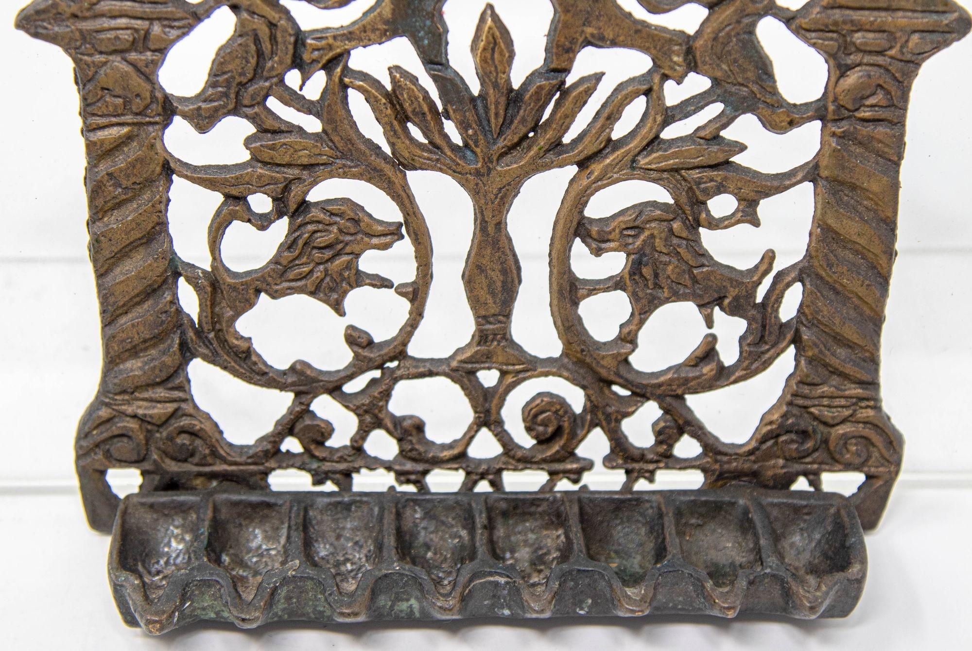 19th Century North-African Brass Hanukkah Lamp Menorah with original patina.
Hanukkah Oil Lamp Judaica Jewish cast Metal Bronze Hanukkah Menorah with birds, lions and flowers.
Cast brass Hanukkah Lamp, Morocco (probably, Sefrou), 19th century.
A