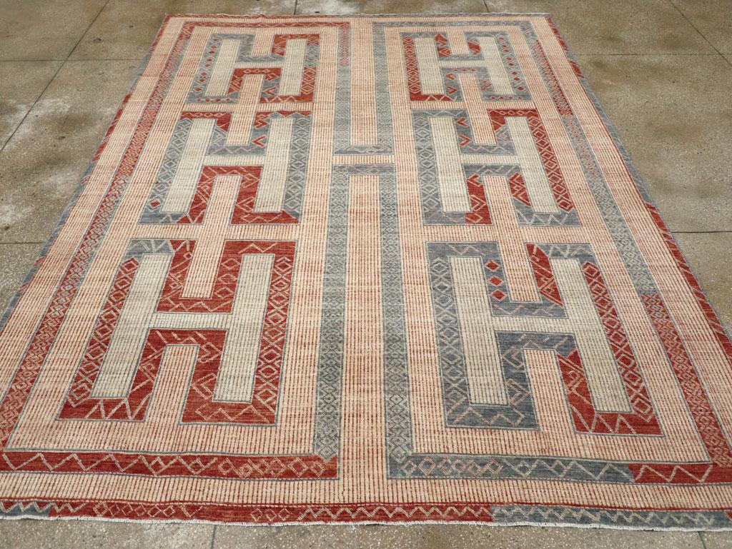 A new Turkish room size carpet inspired by North African tribal Tuareg rugs, handmade during the 21st century.

Measures: 9' 3