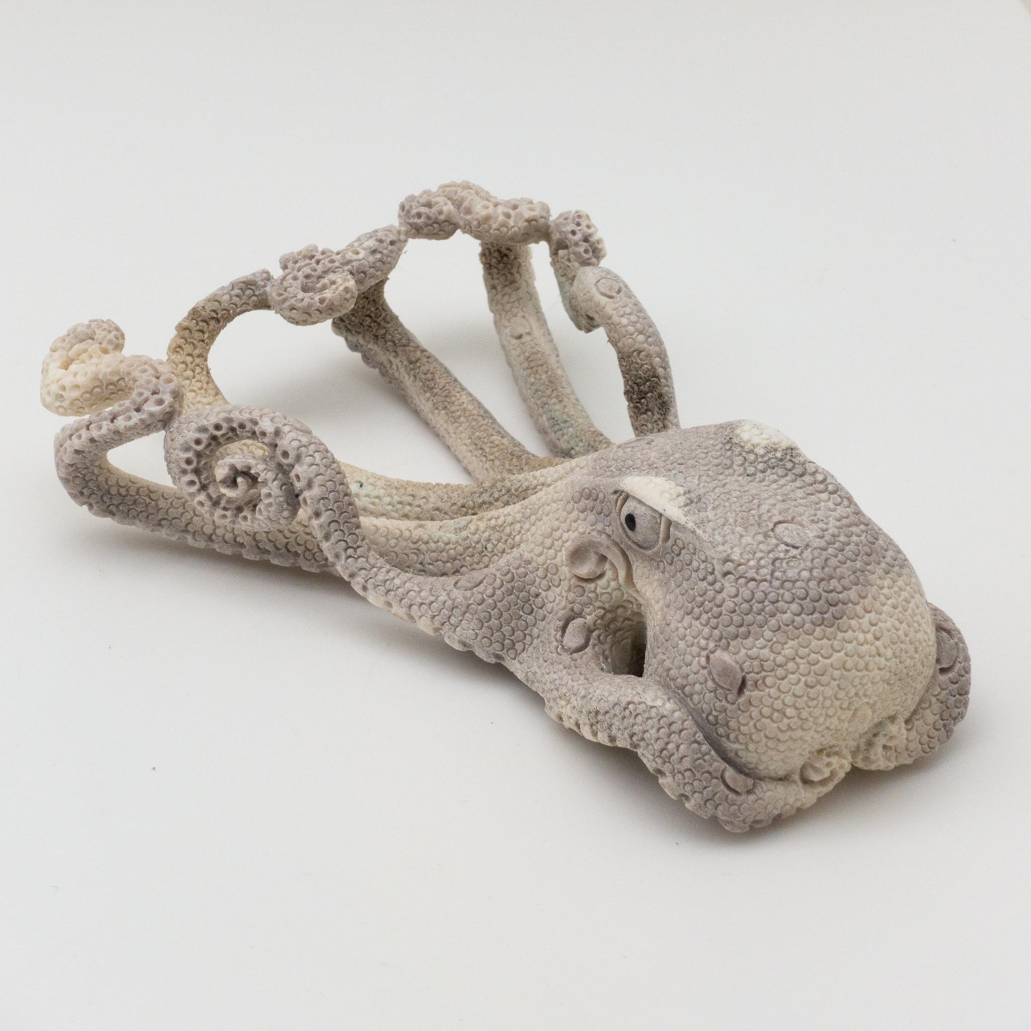 Detailed moose antler carving of an octopus, from Indonesia. This is a one of a kind object. The moose antler was sourced in North America and then sent to Asia for carving. Quality of ivory, but with sustainability, as the moose naturally shed
