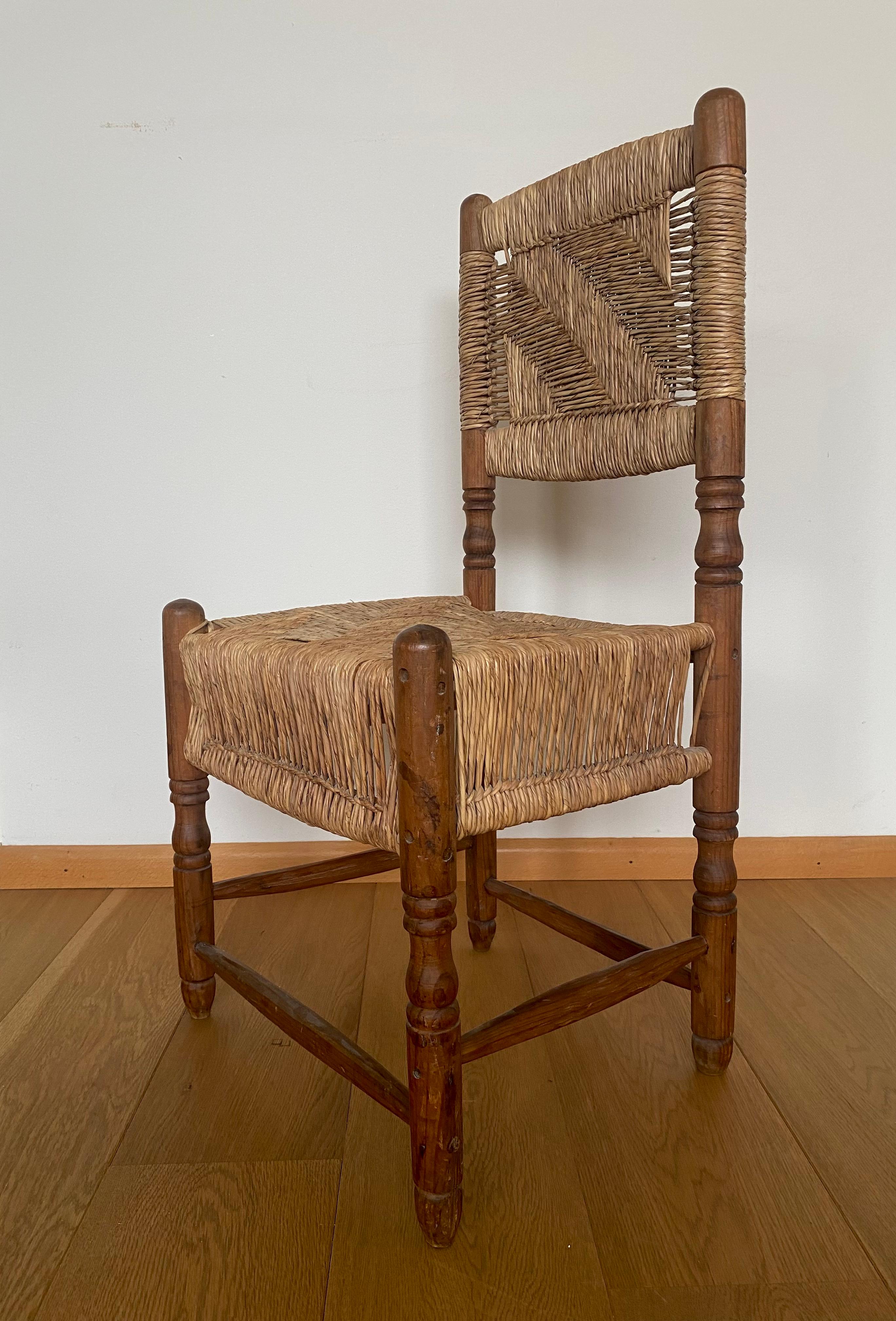 antique wooden chair with woven seat