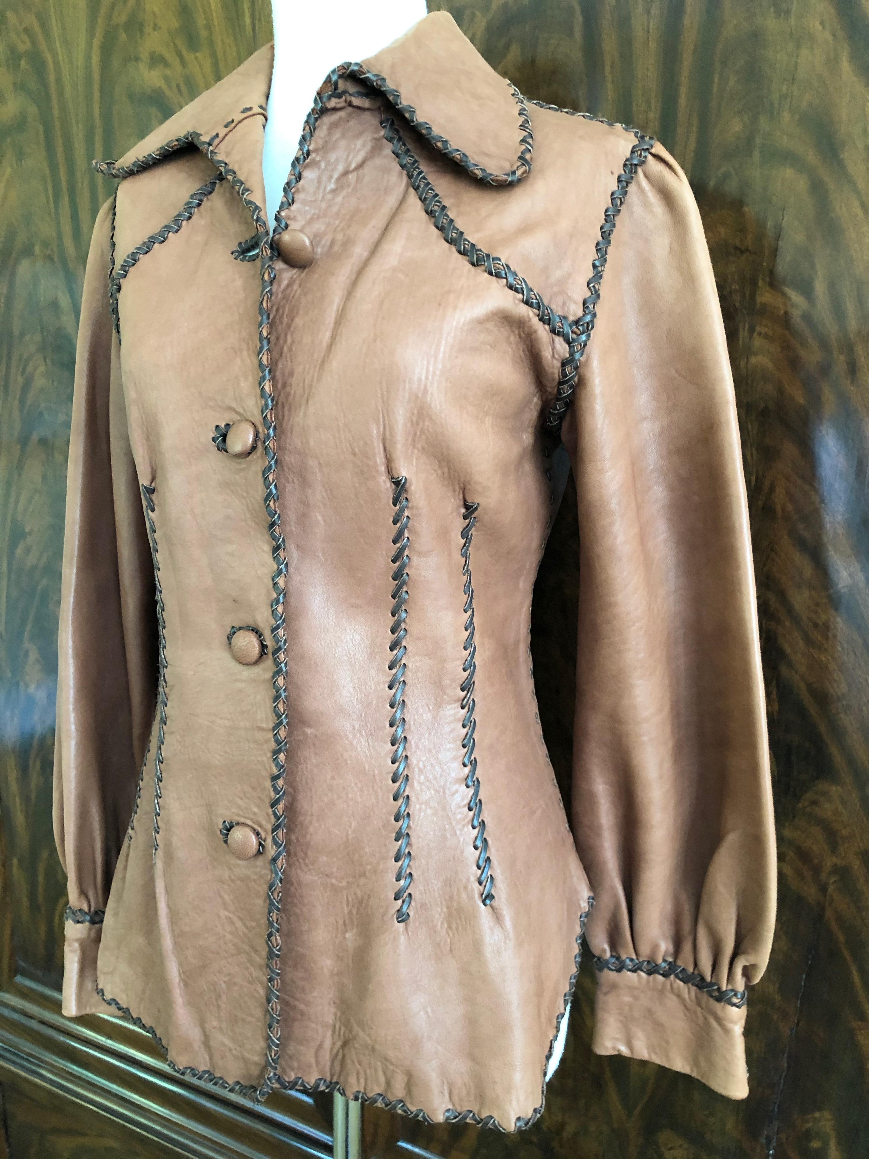 North Beach Leather Early 1970's Whipstitched Leather Rich Hippie Jacket
Classic vintage North Beach Leather whip stitched jackt.
Crafted in Mexico, this is a rare treasure. In great pre owned condition, there are some spots, but not too